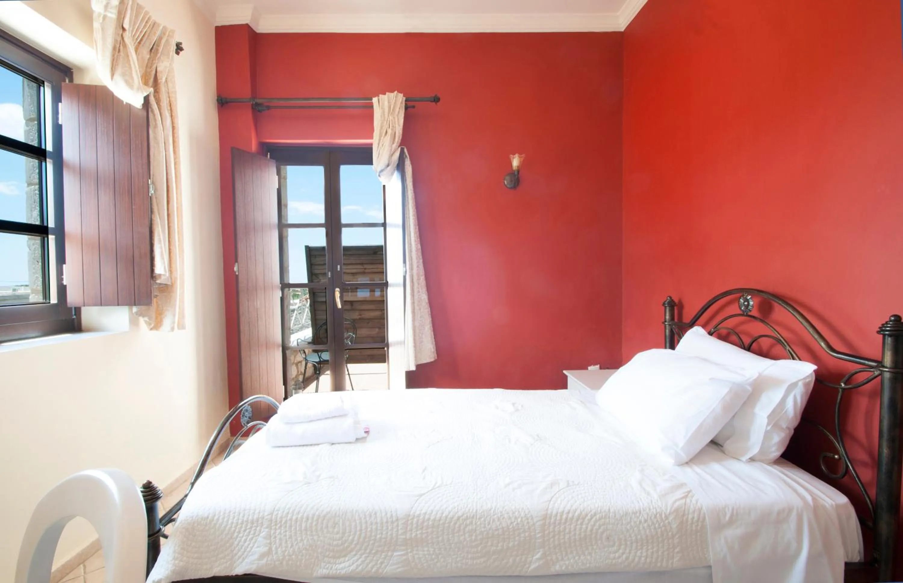 Bed in Areos Polis Boutique Hotel