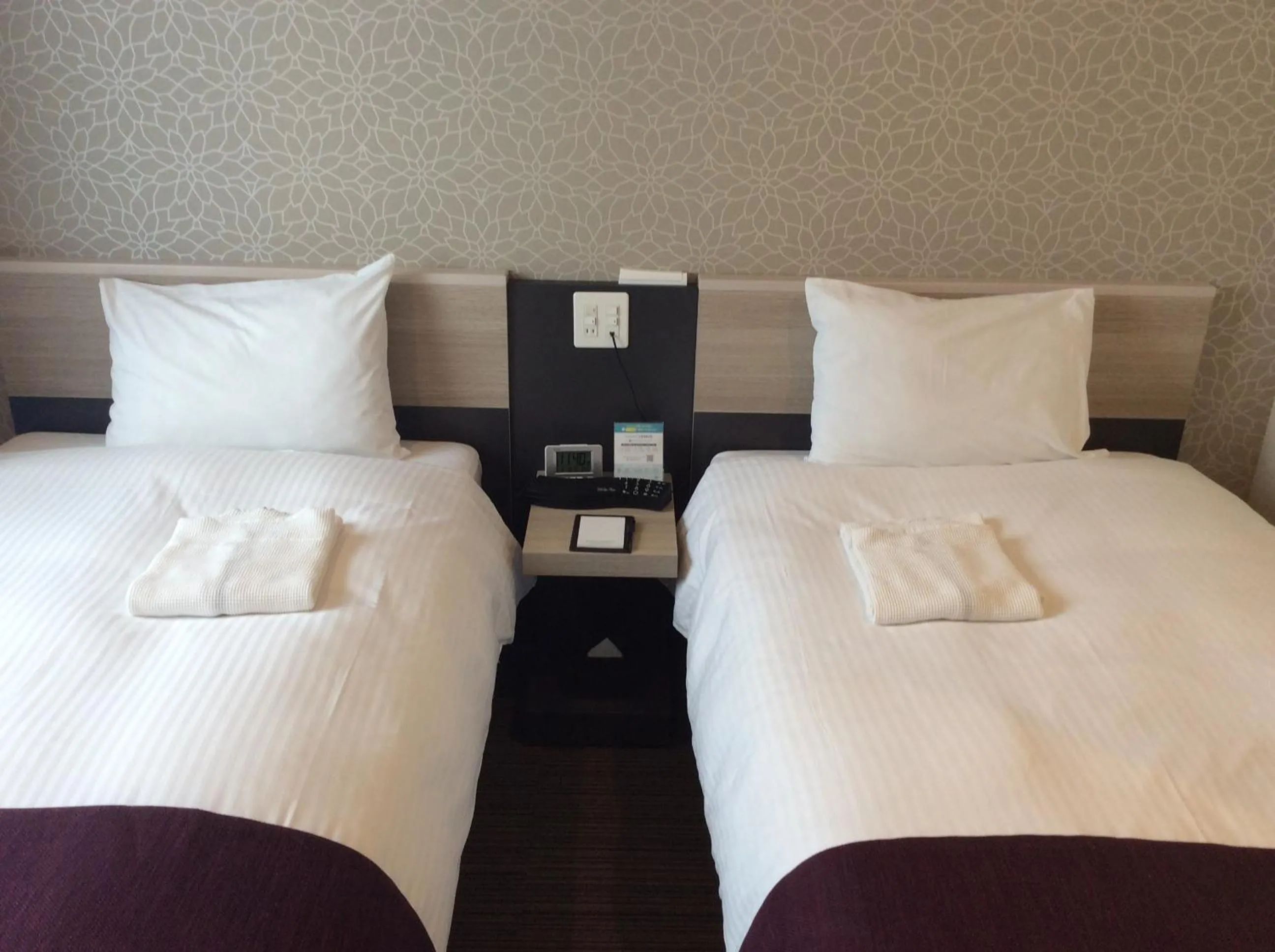 Bed in Kuretake Inn Osaka Sakaisuji Honmachi