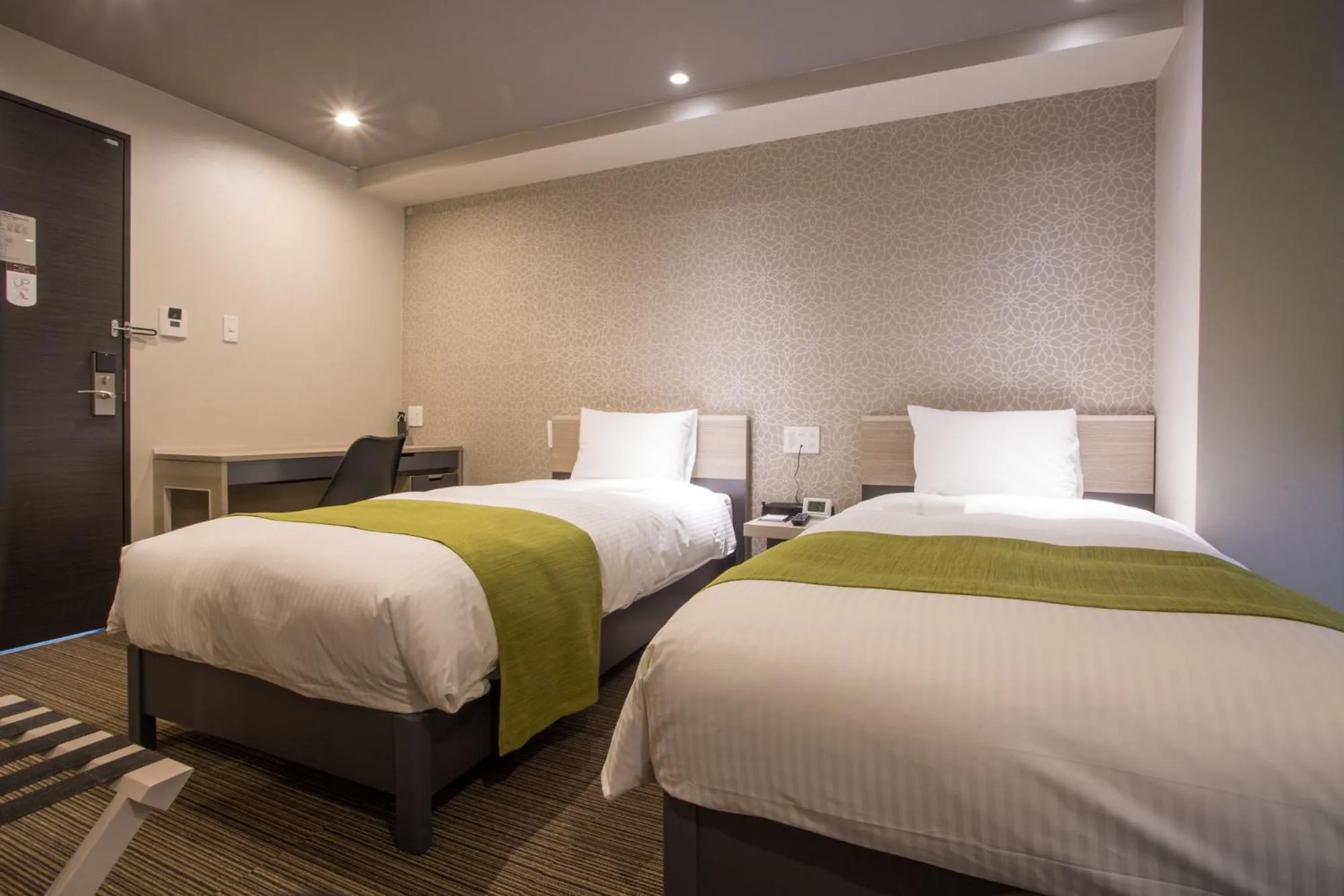 Bed in Kuretake Inn Osaka Sakaisuji Honmachi