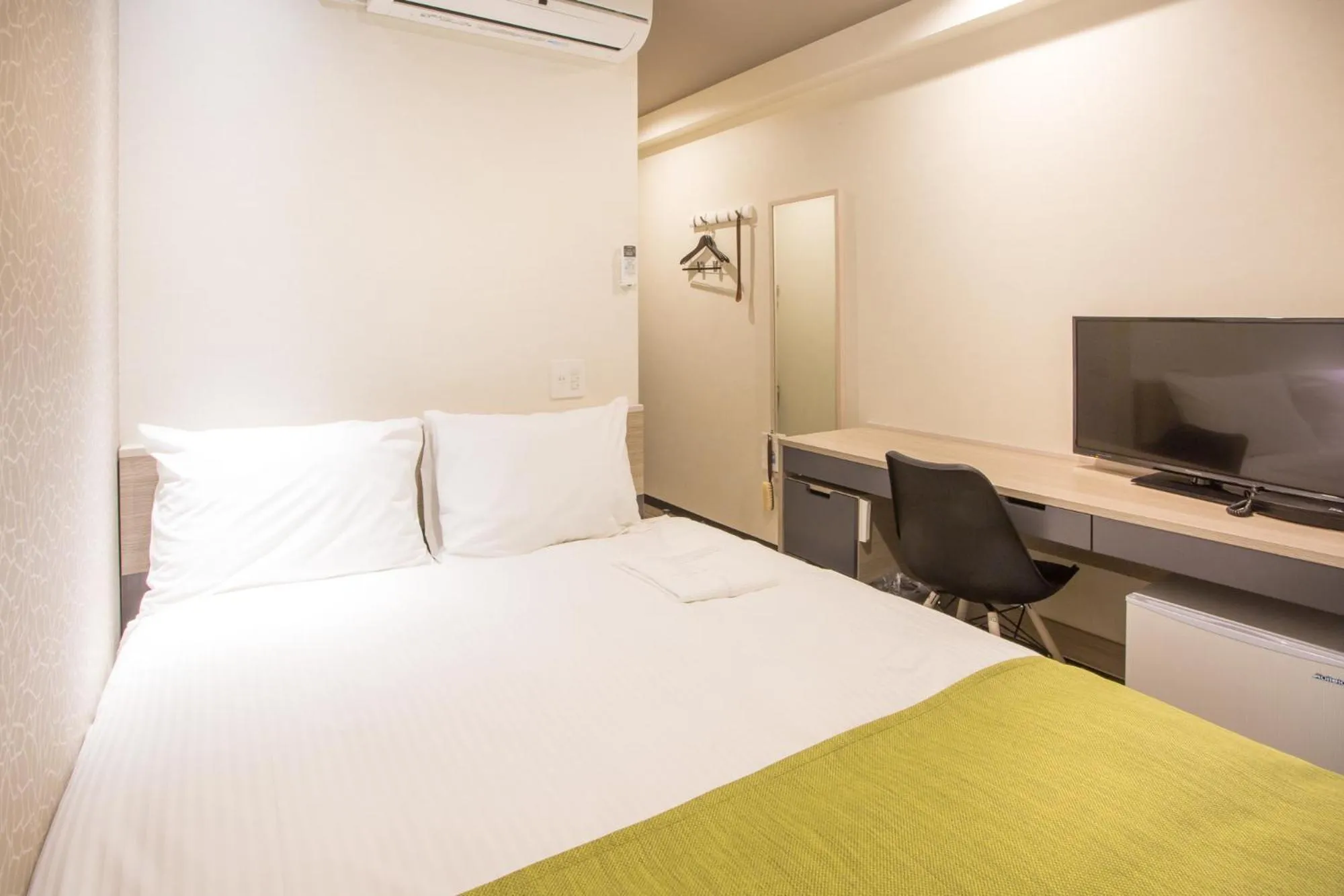 Bed in Kuretake Inn Osaka Sakaisuji Honmachi