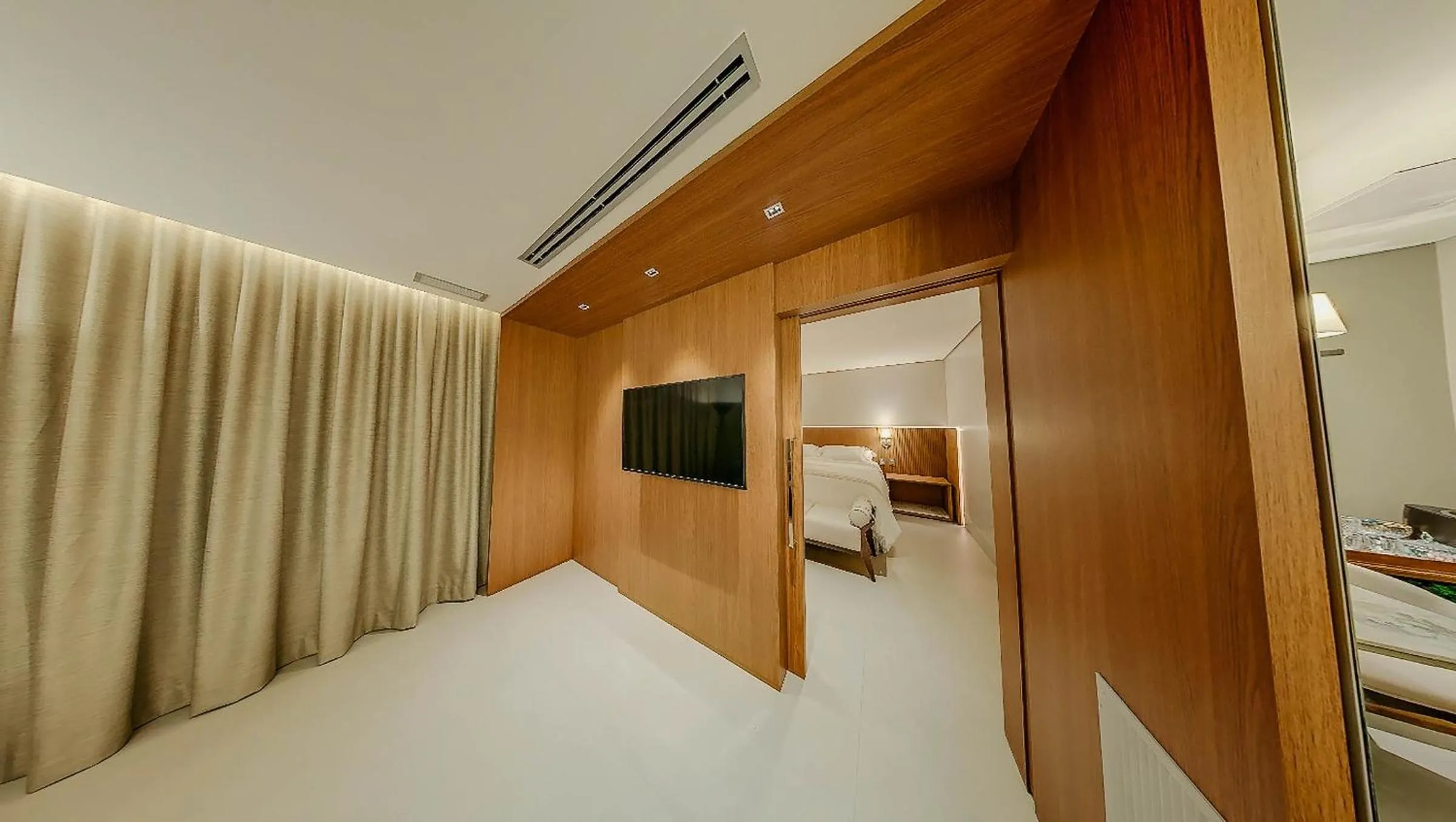 Communal lounge/ TV room, Bed in Amazon Taiamã Hotel