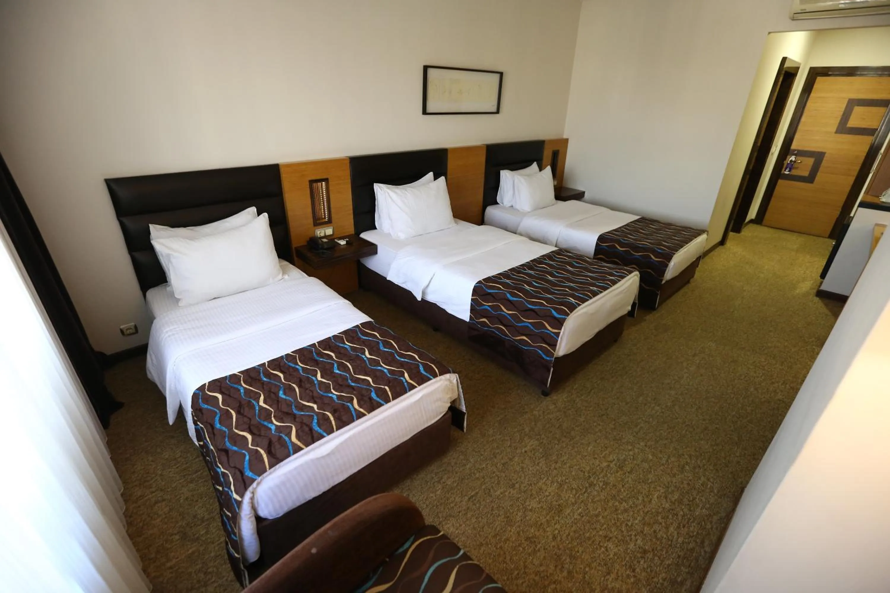 Bed in North Point Hotel