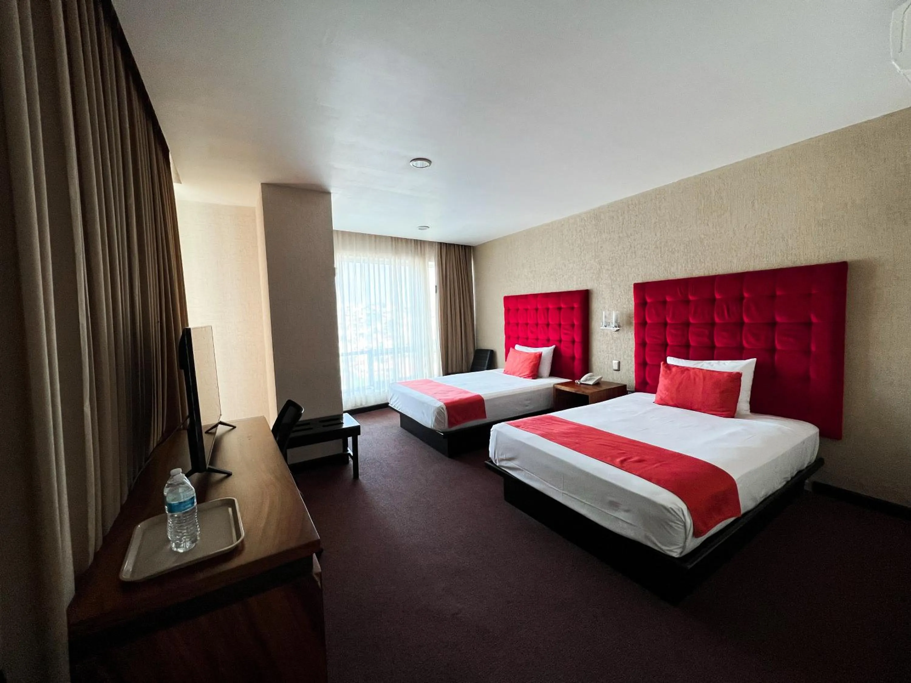 Bedroom, Bed in Hotel Vista Inn Premium