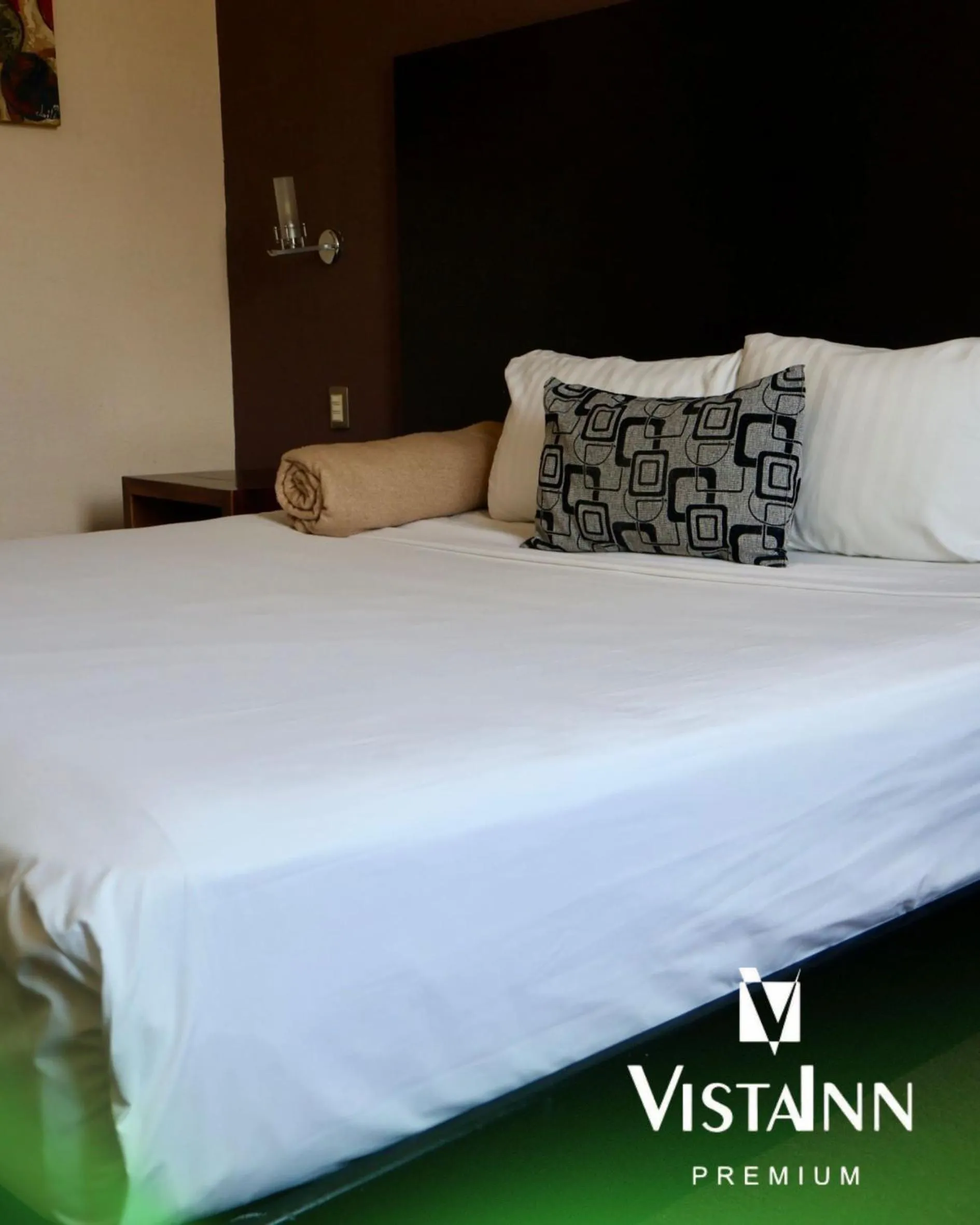Bed in Hotel Vista Inn Premium