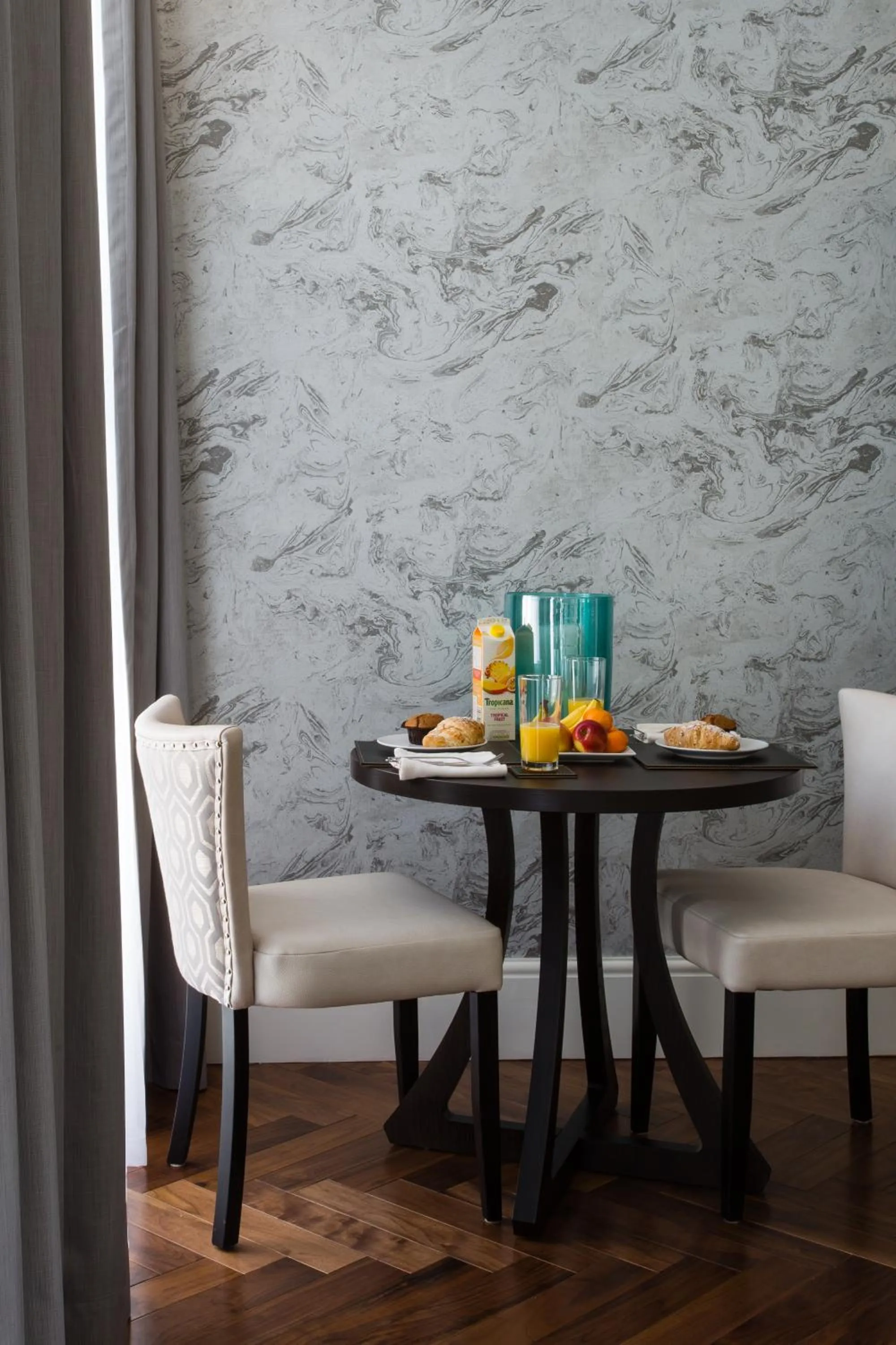 Dining area in Baker Street by Viridian Apartments