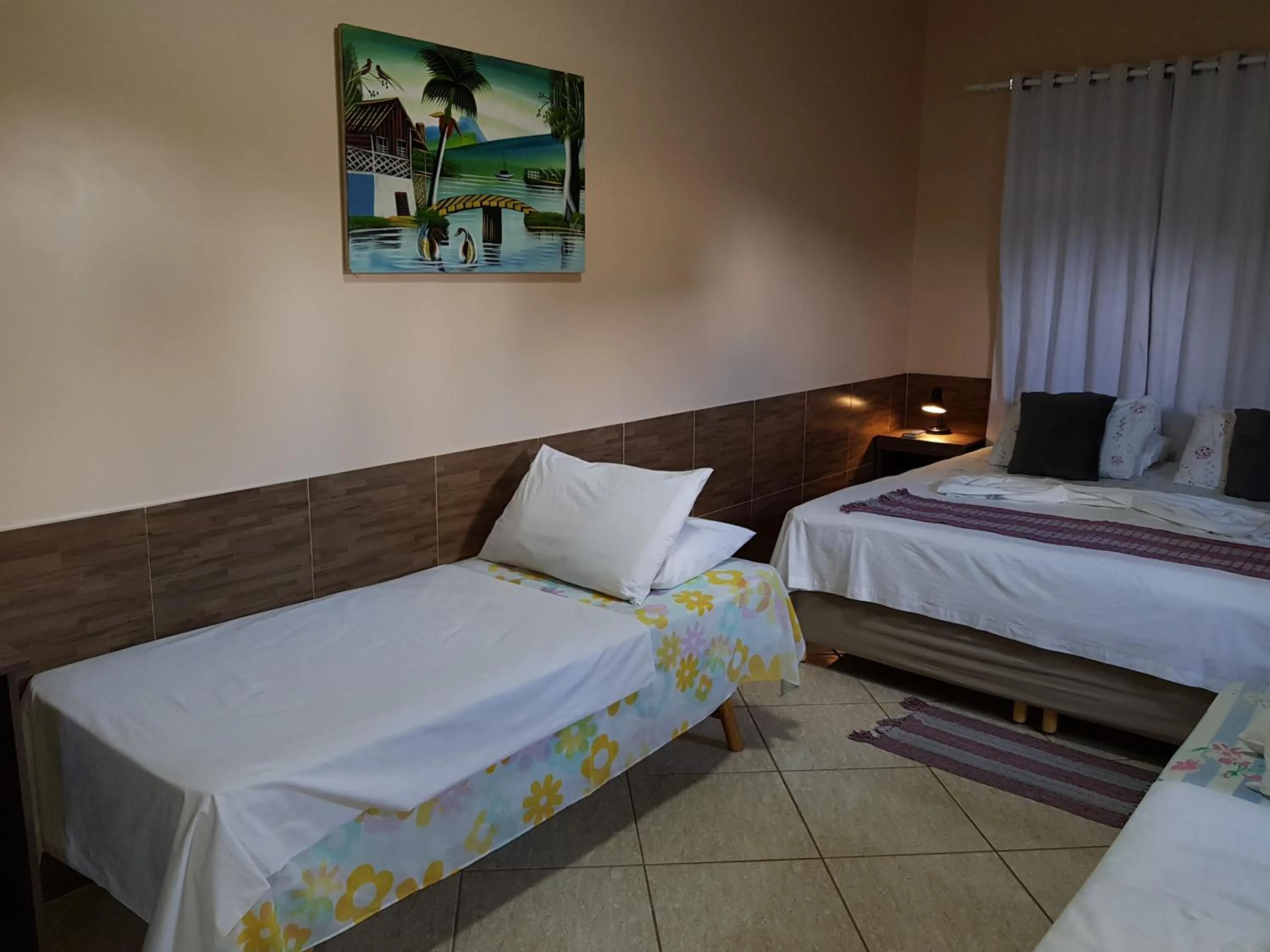 Bed in Pousada Jagatá