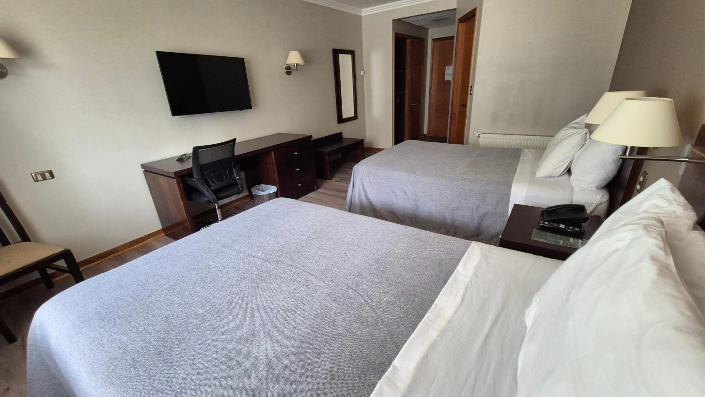 Photo of the whole room, Bed in Hotel Diego de Almagro Coyhaique