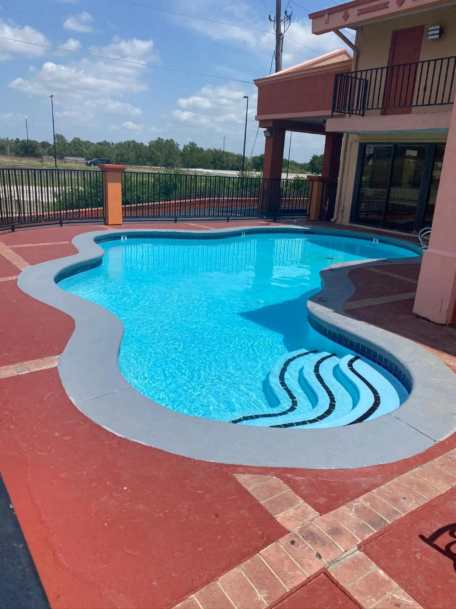 Swimming pool in Super 8 by Wyndham Tulsa/Arpt/St Fairgrounds