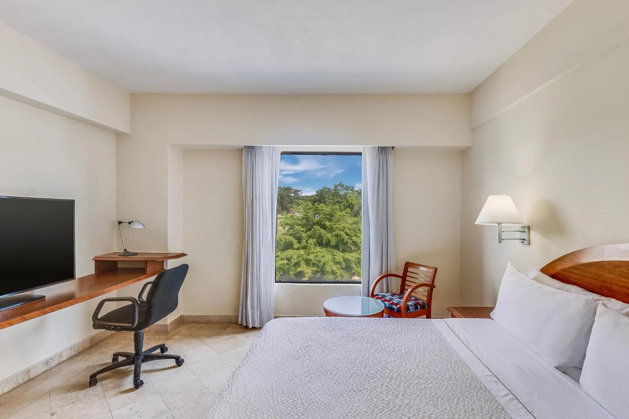 Photo of the whole room, Bed in Fiesta Inn Colima