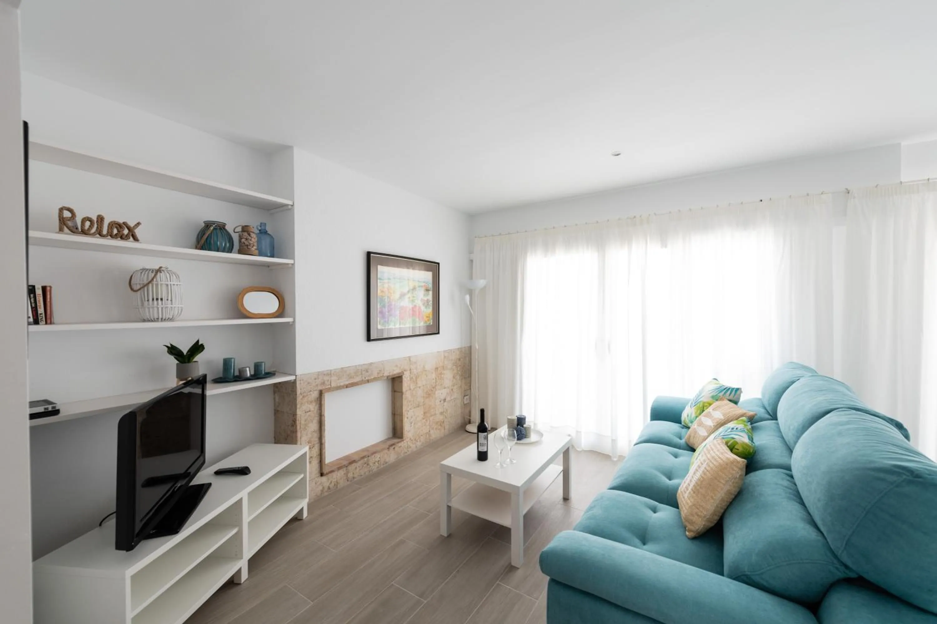 Seating area in Apartamentos Marblau