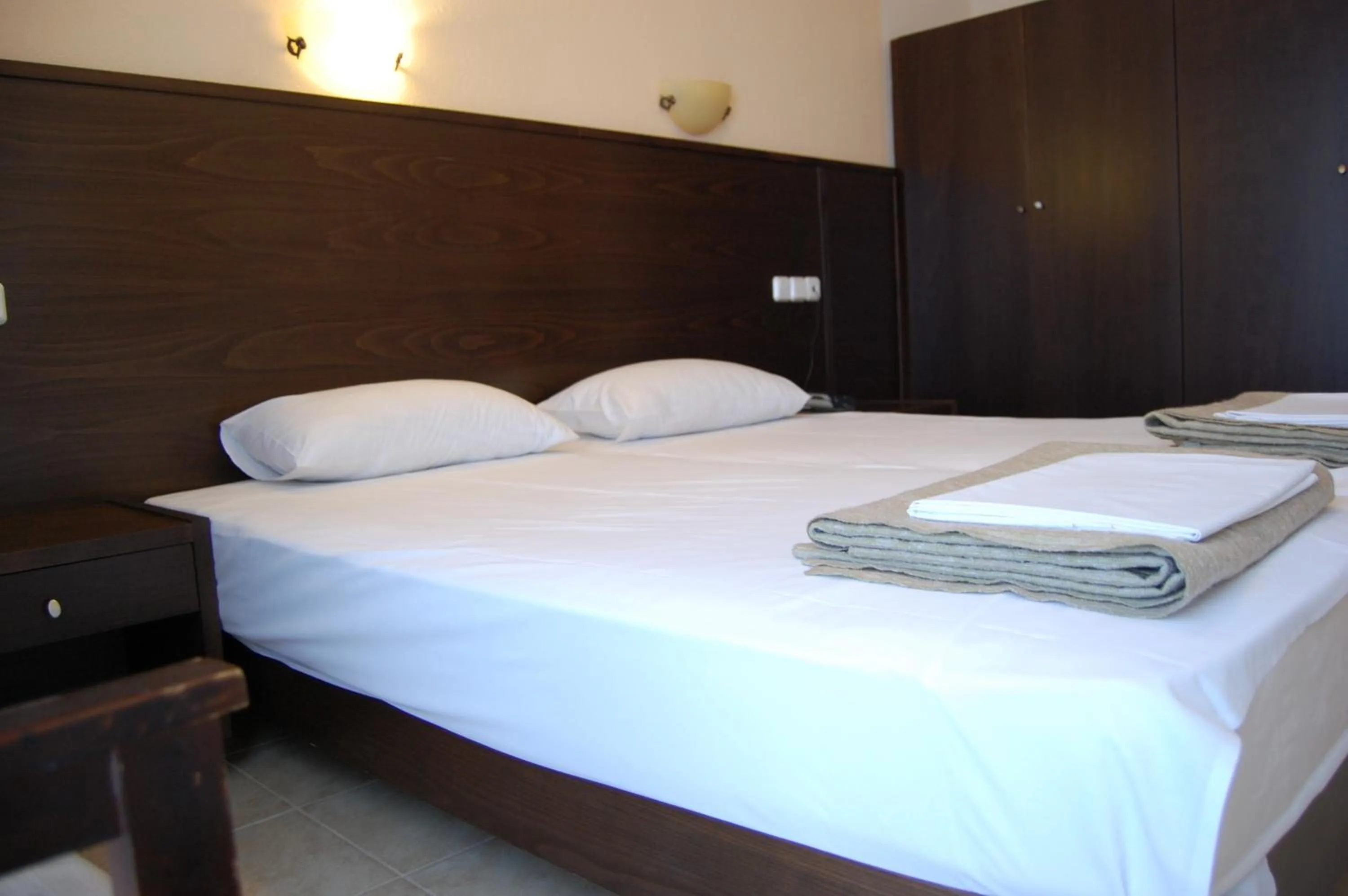 Bed in Hotel Achillion