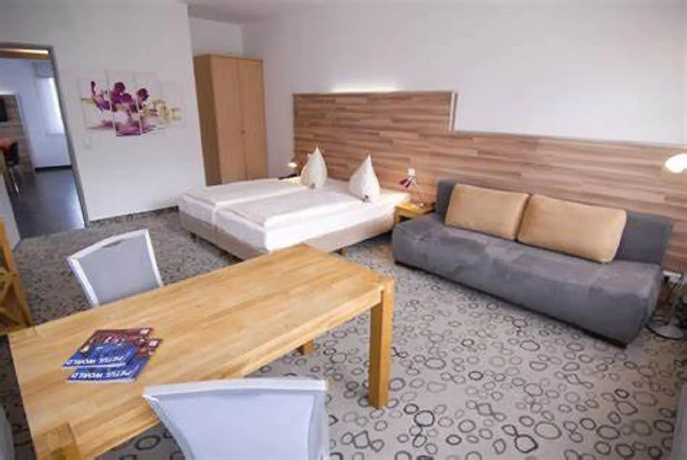 Seating area, Bed in Petul Apart Hotel Am Ruhrbogen