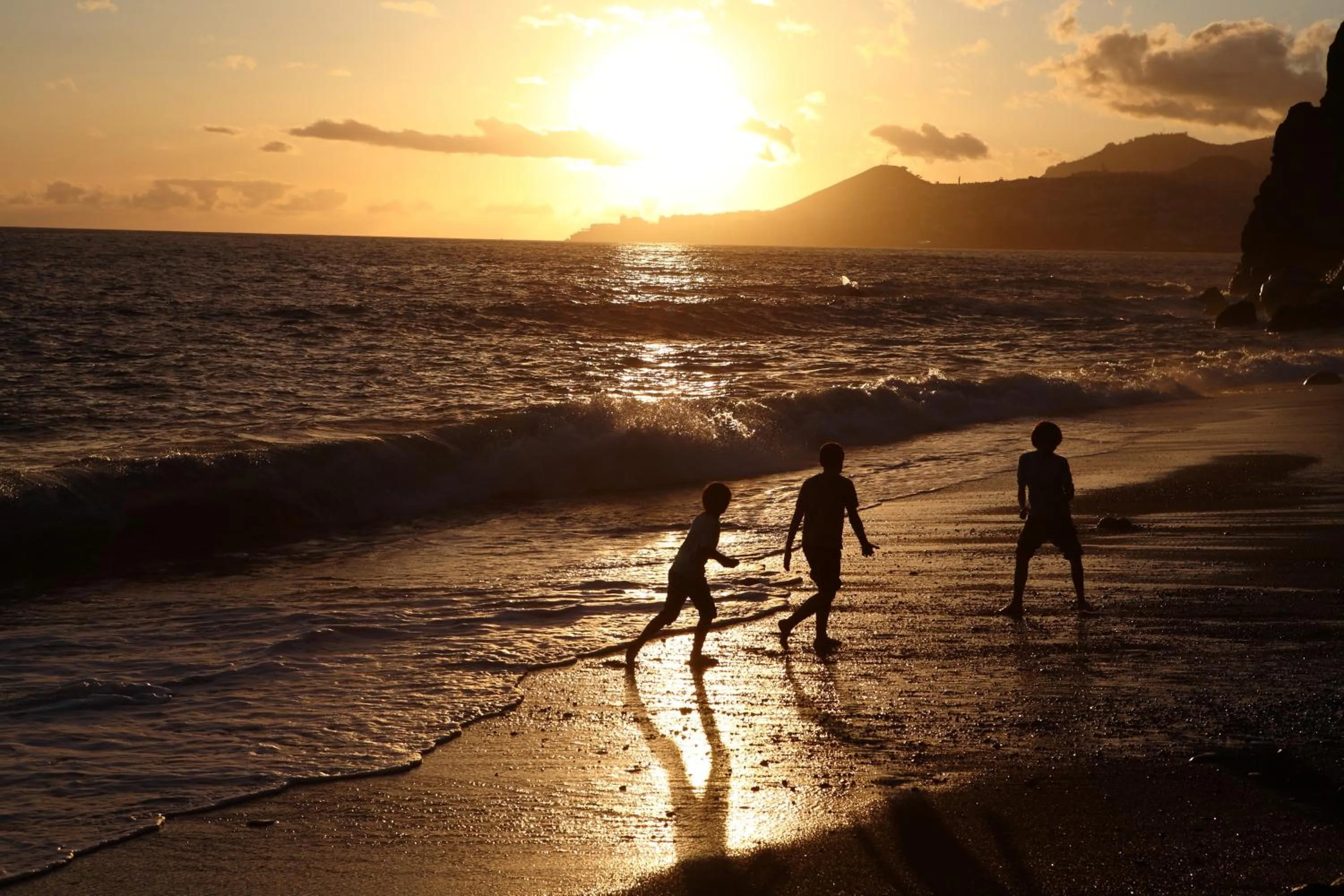Beach in Canico Bay Apartments