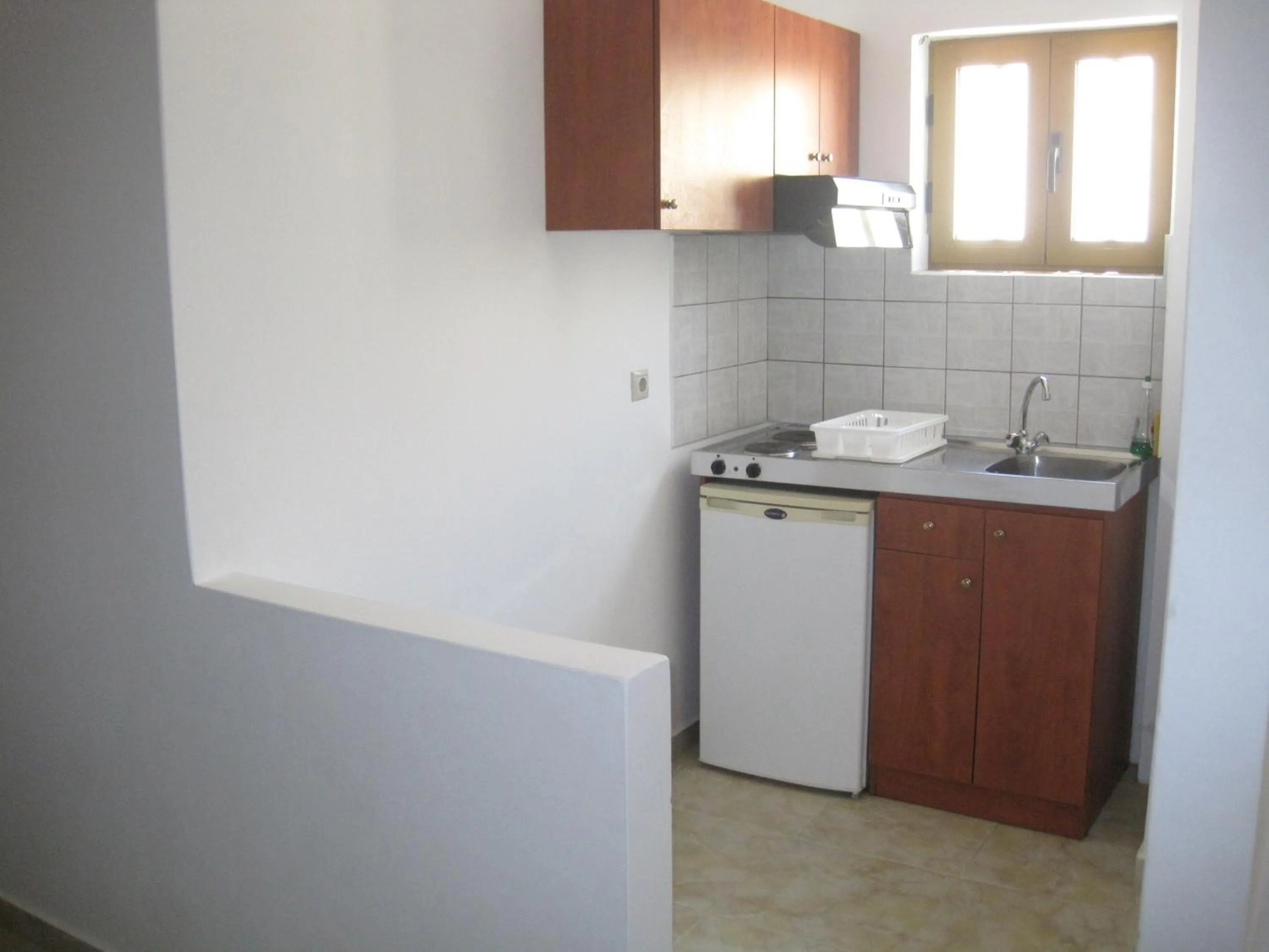 Kitchen or kitchenette in Sfinias Apartments