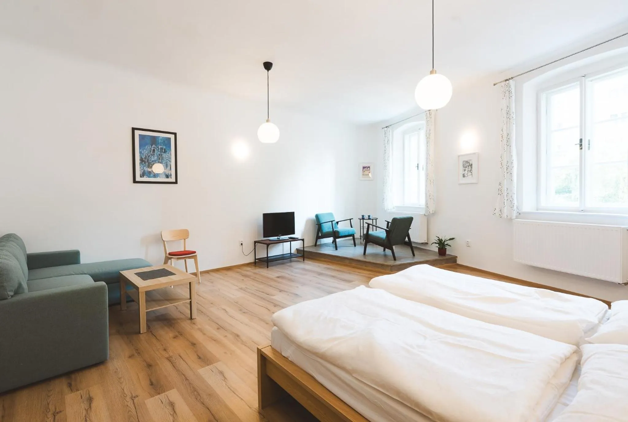 Living room, Bed in Downtown Apartments