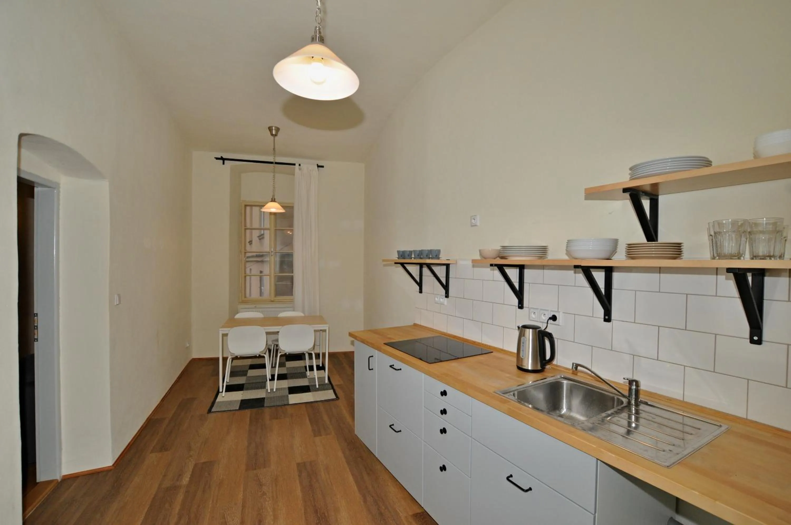 Kitchen or kitchenette in Downtown Apartments