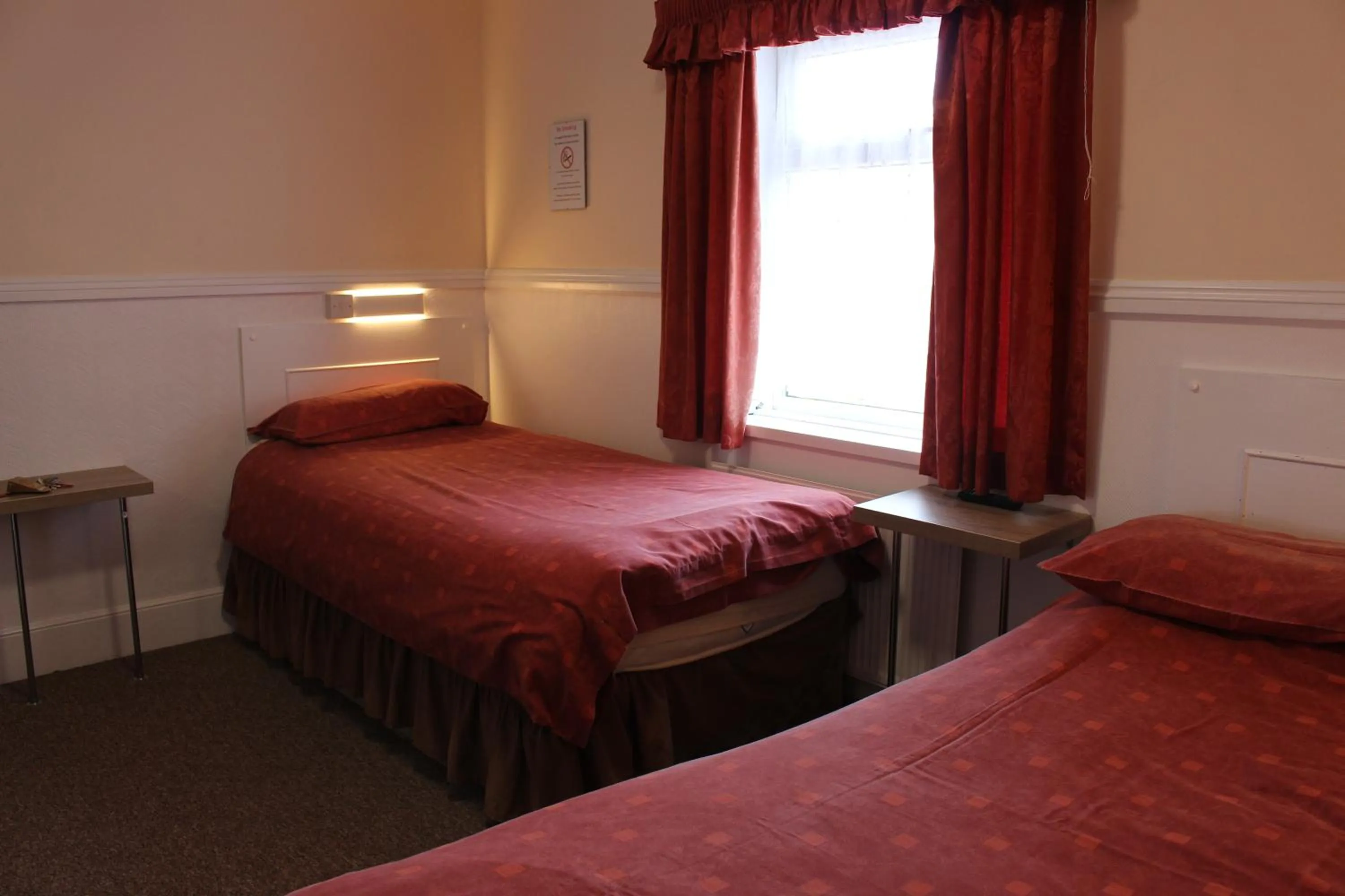 Bed in The Rollason Hotel