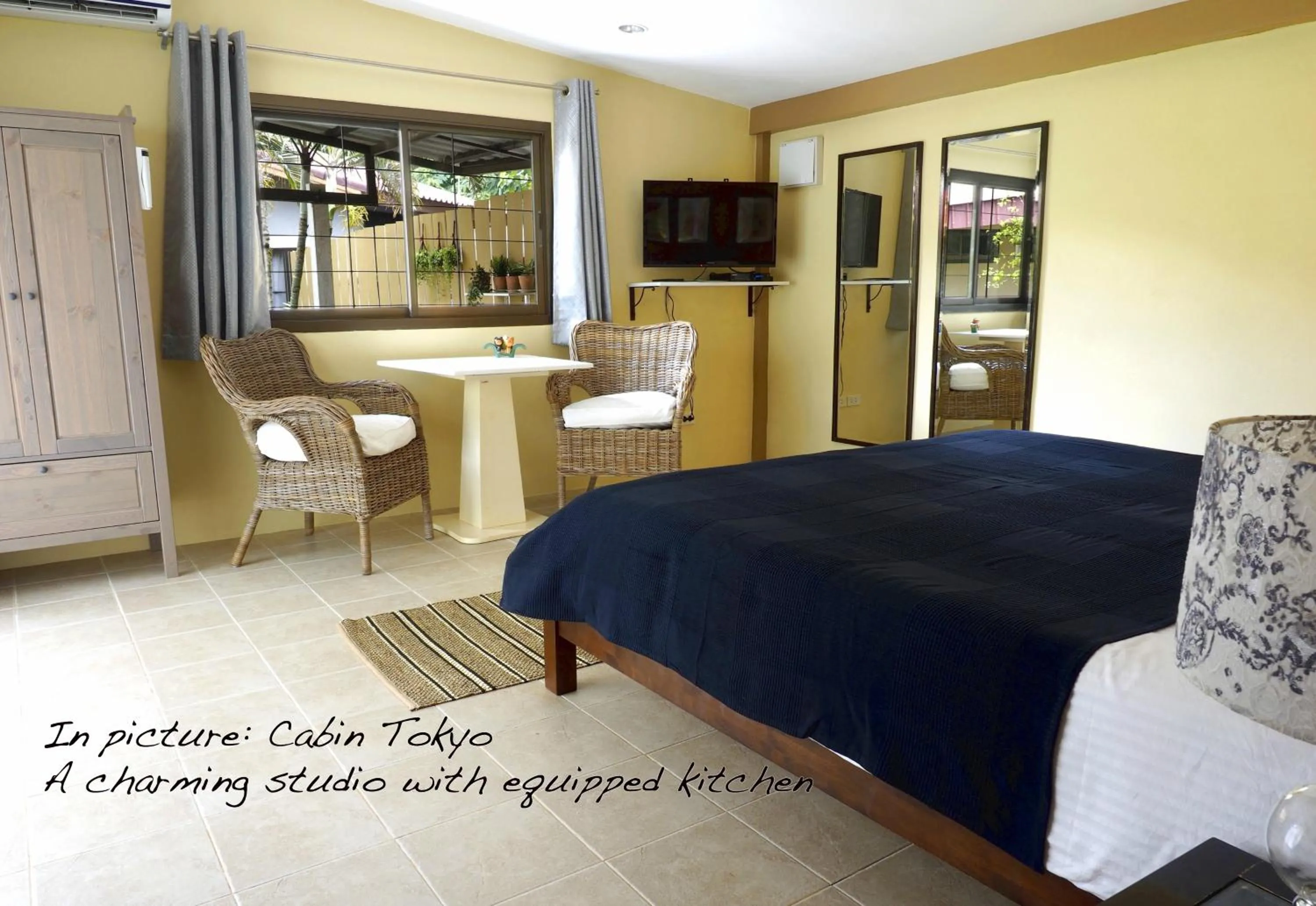 Seating area, Bed in Escape-Cabins