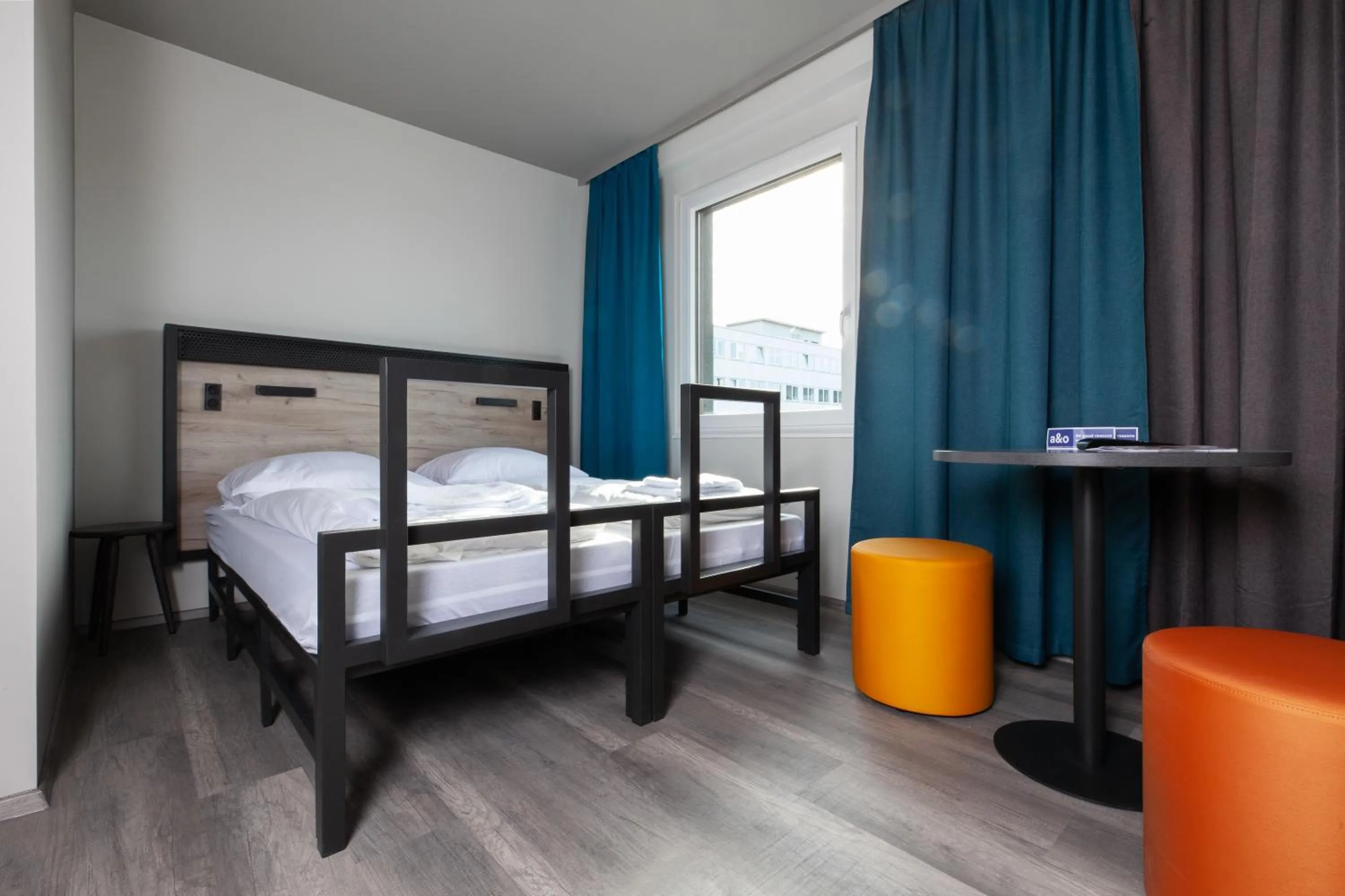 Photo of the whole room, Bed in a&o Frankfurt Ostend