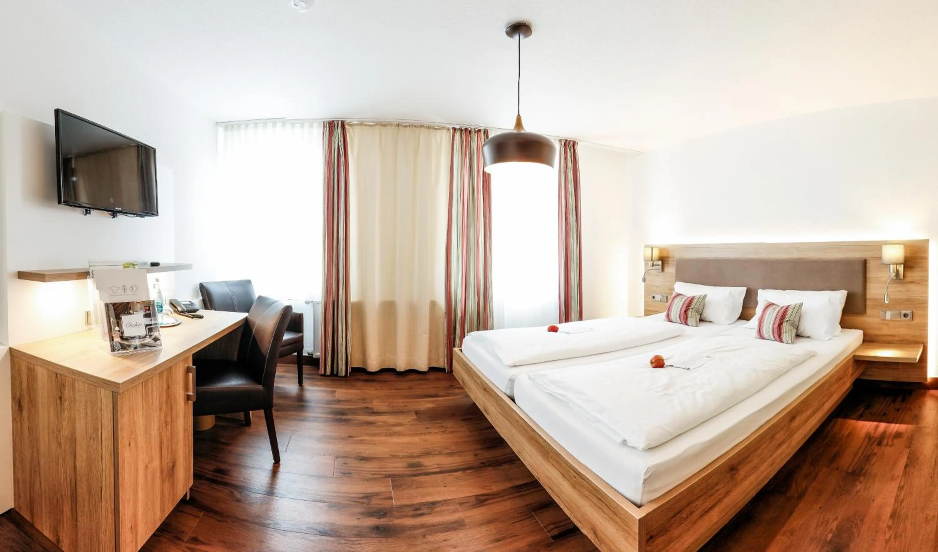 Photo of the whole room, Bed in Widmann's Löwen