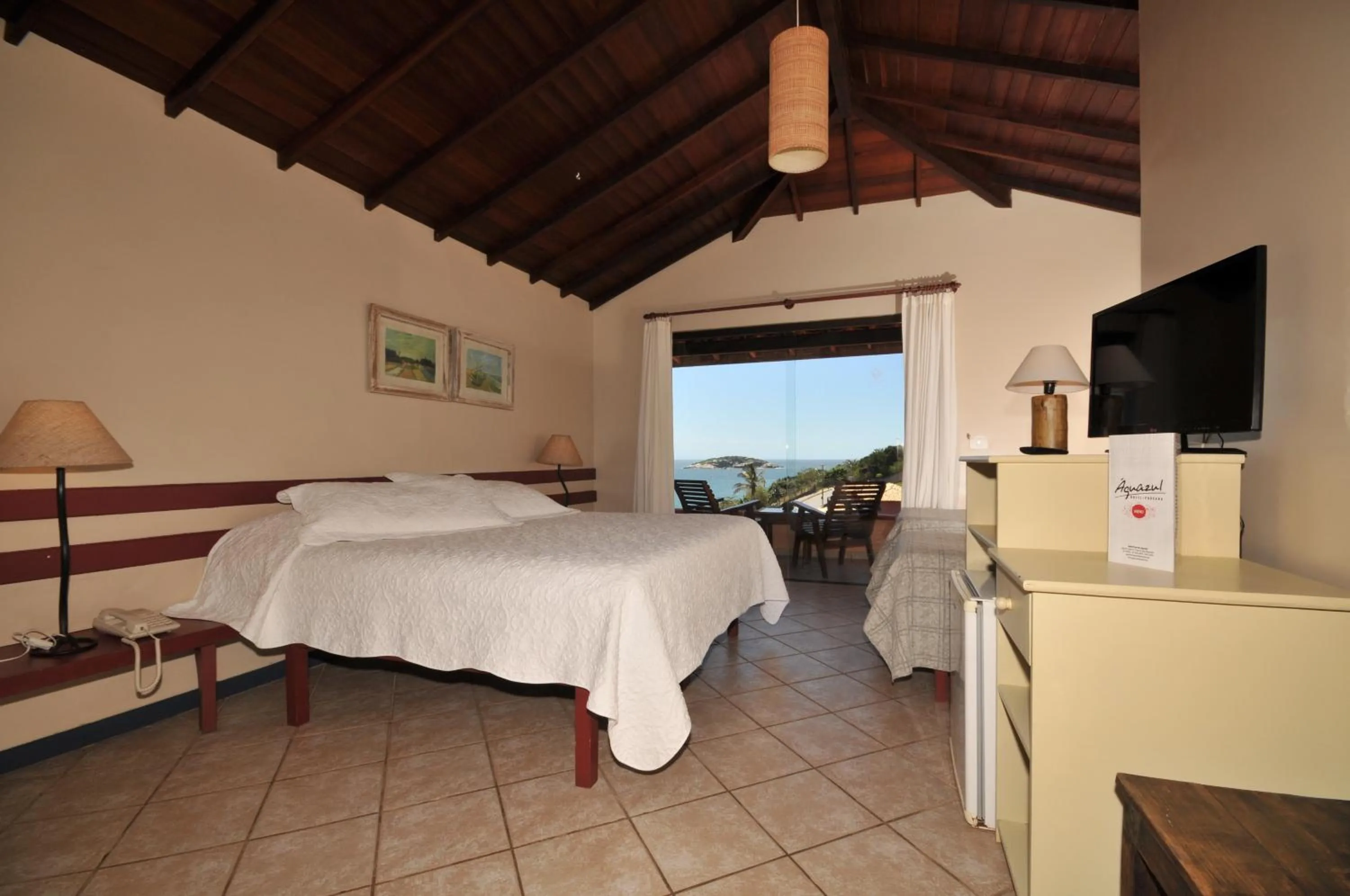 Bed in Aguabúzios Hotel