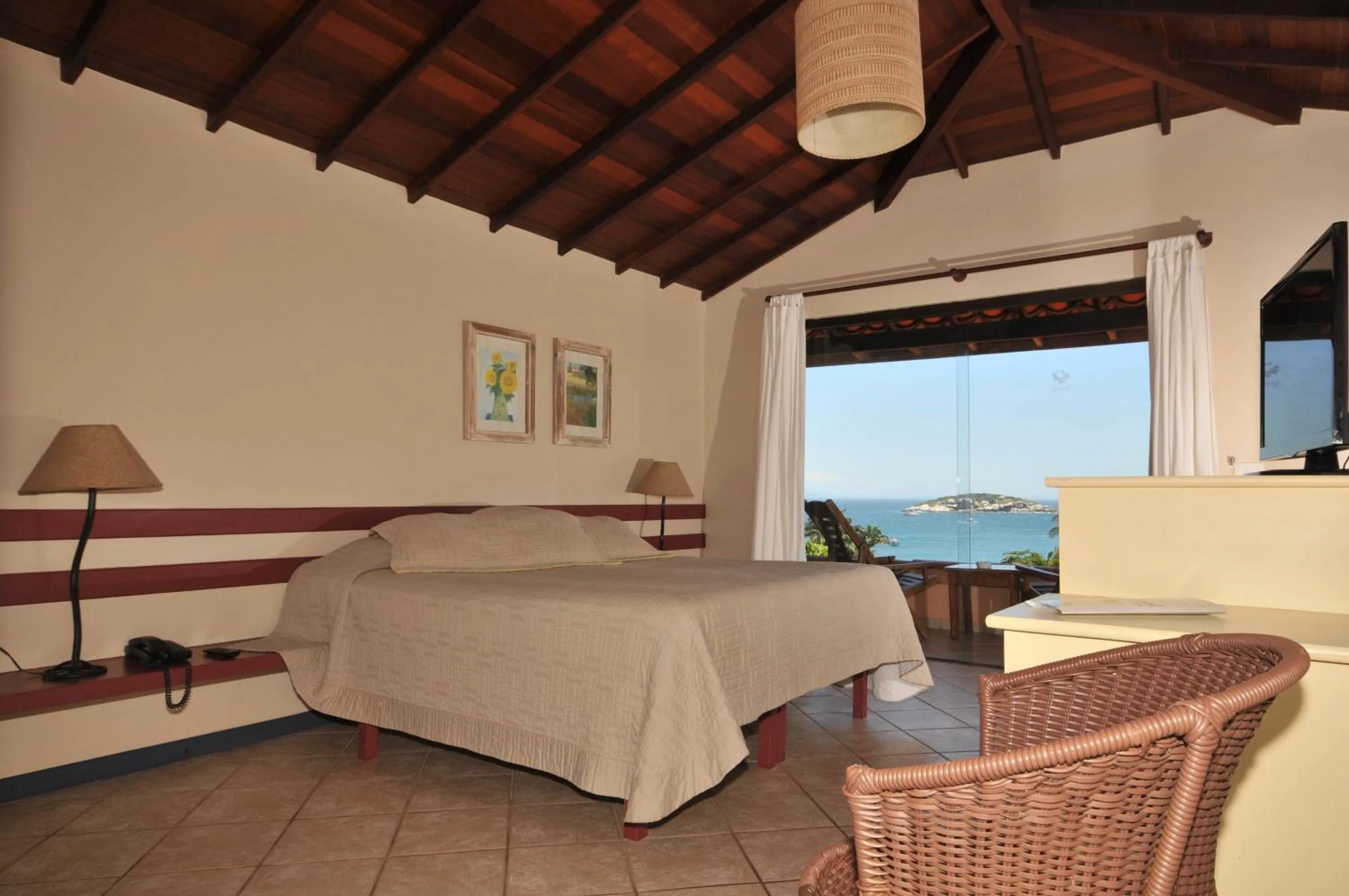 Bed in Aguabúzios Hotel