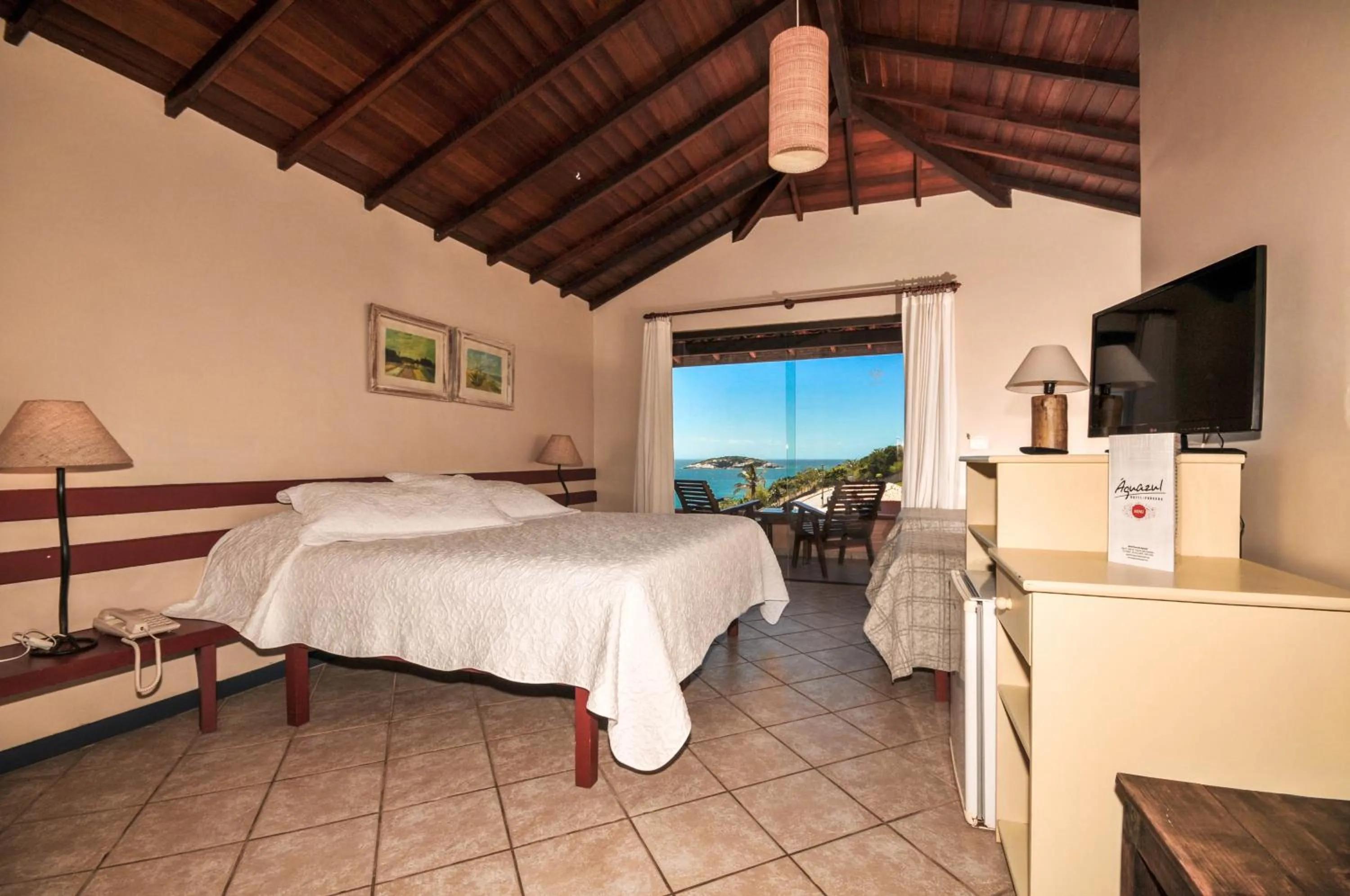 Bed in Aguabúzios Hotel