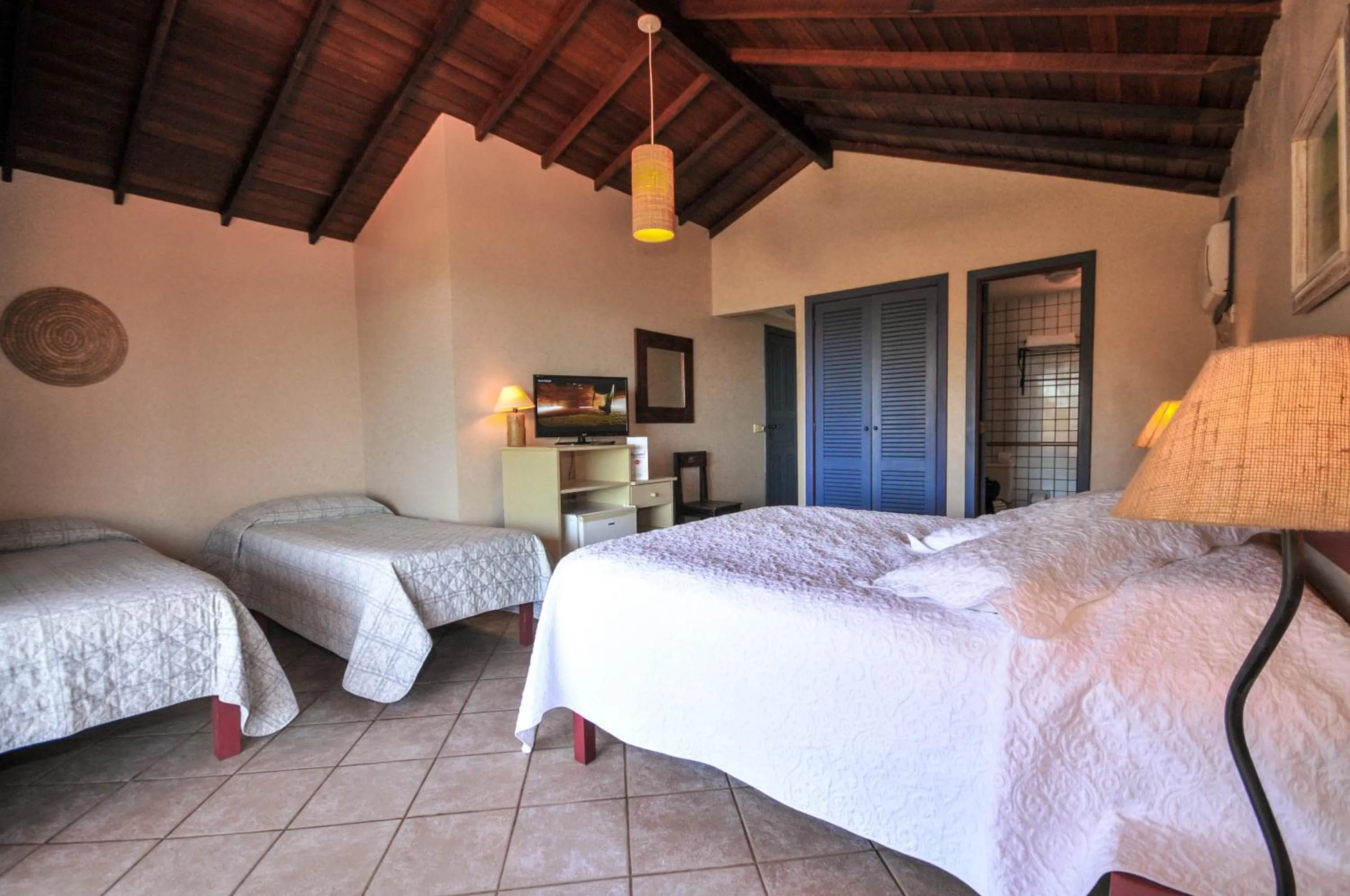 Bed in Aguabúzios Hotel