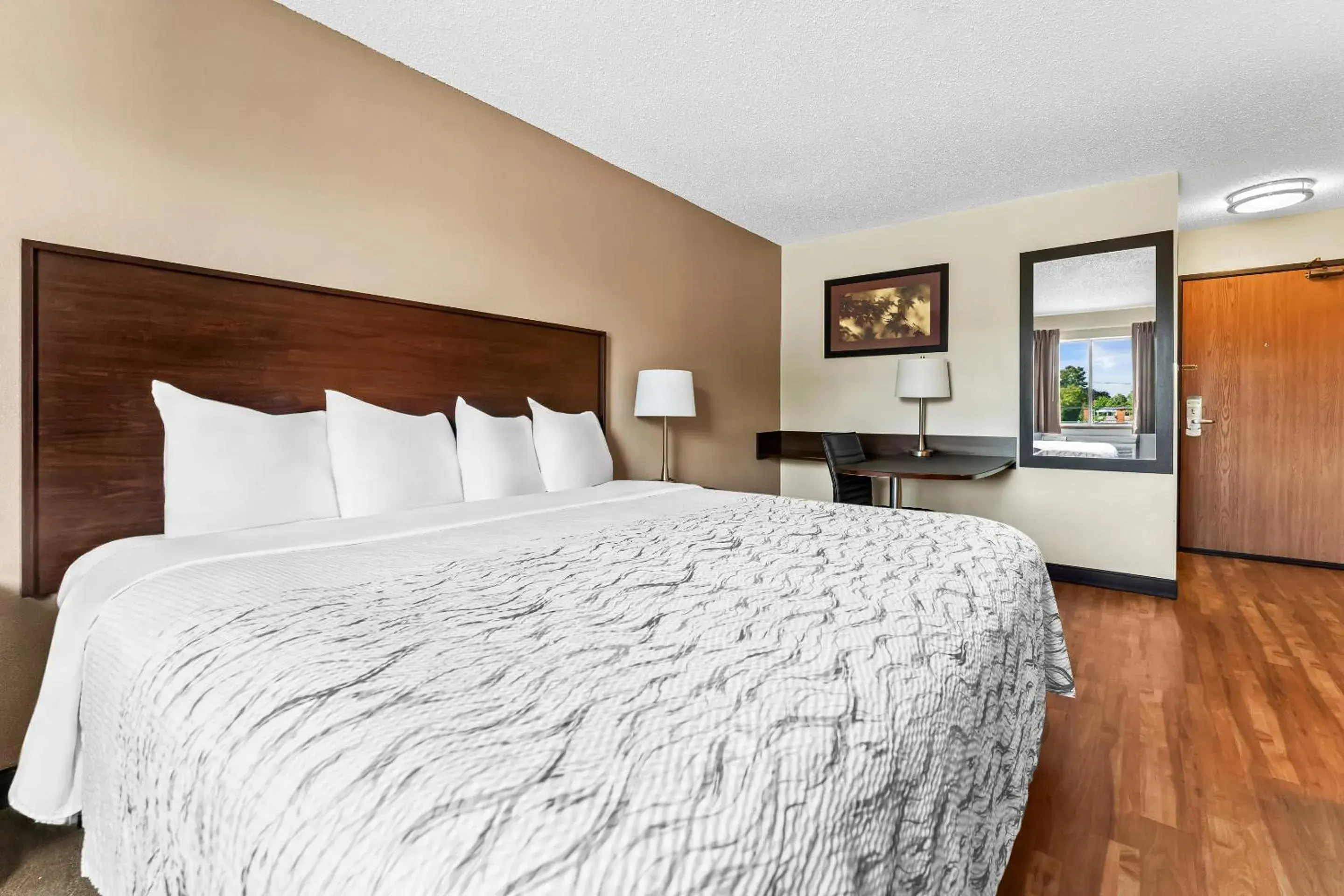 Deluxe King Room Smoke Free in Red Roof Inn PLUS+ & Suites Malone Deluxe King Room Smoke Free in Red Roof Inn PLUS+ & Suites Malone