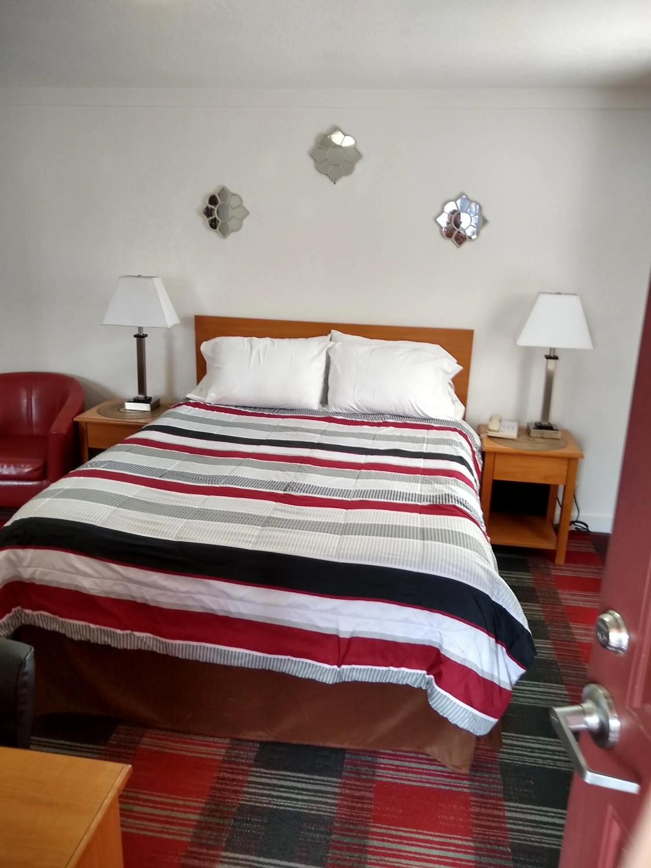 Bed in Holiday Motel Bend