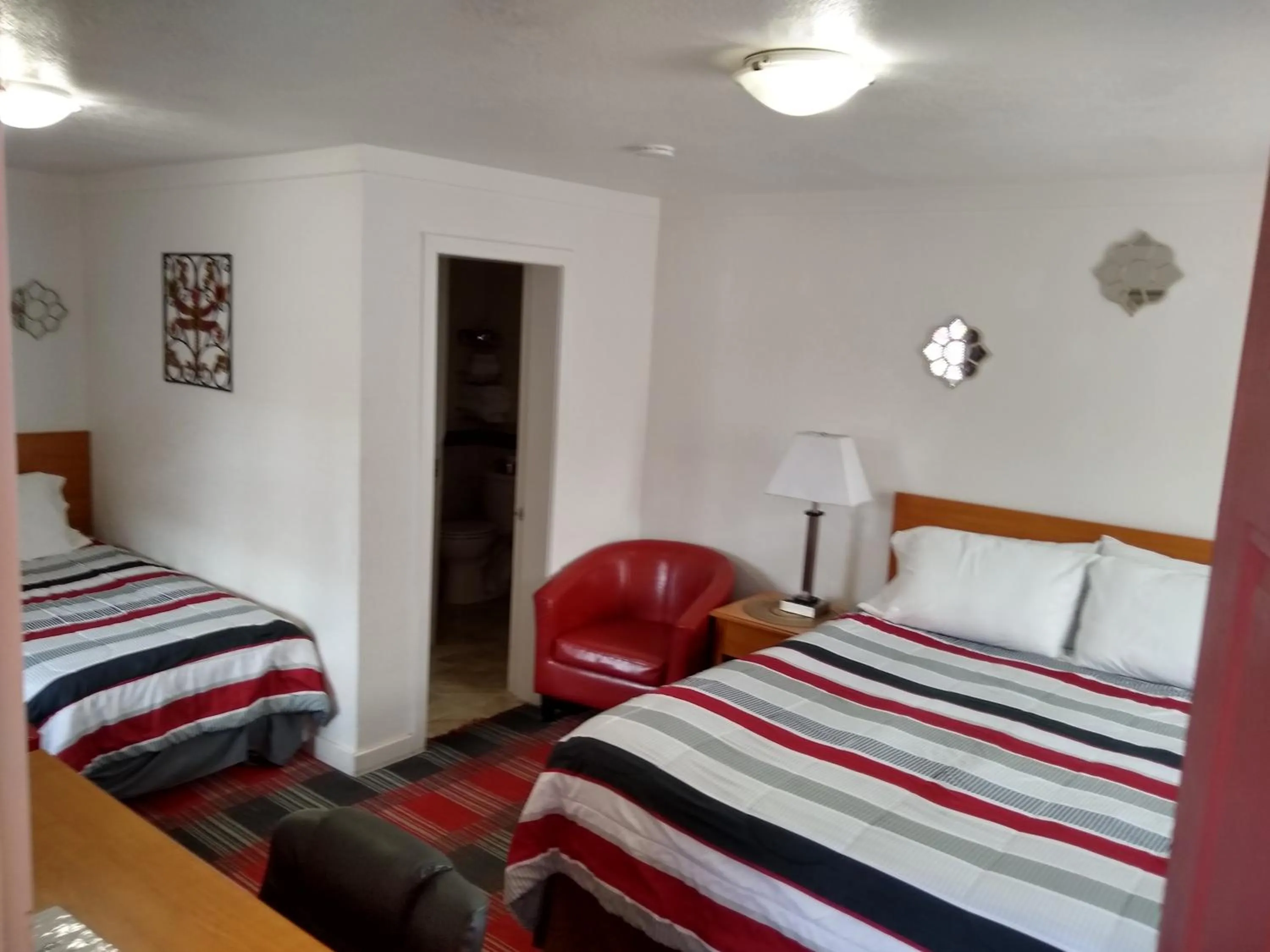 Bed in Holiday Motel Bend