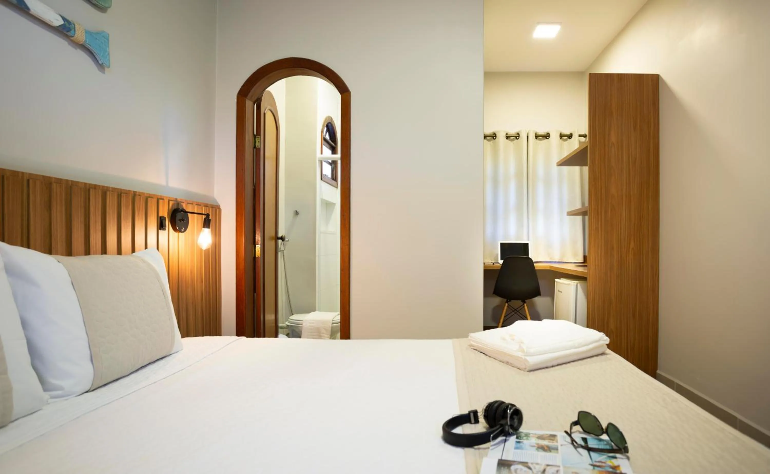 Bed in Pousada Timoneiro