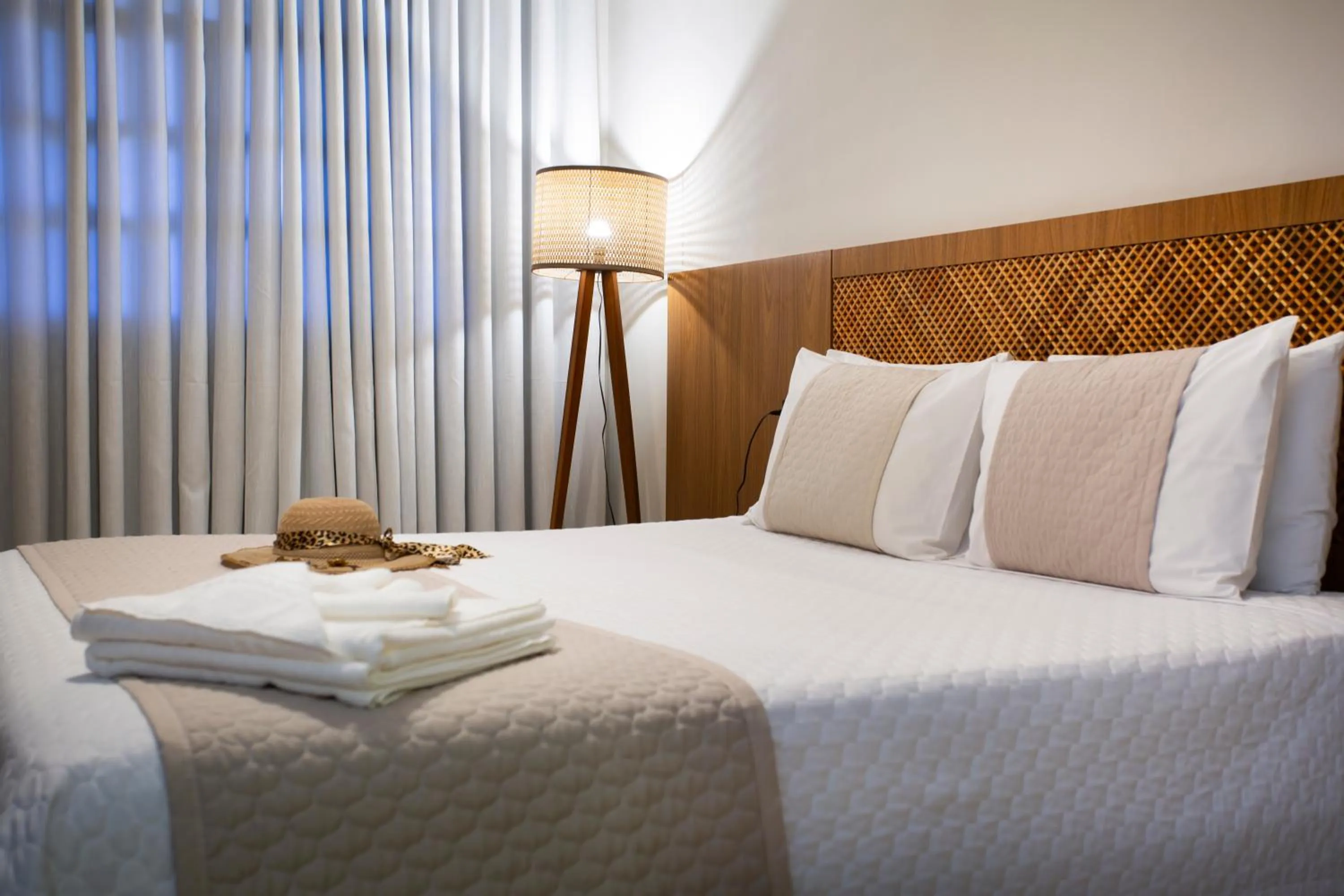 Bed in Pousada Timoneiro