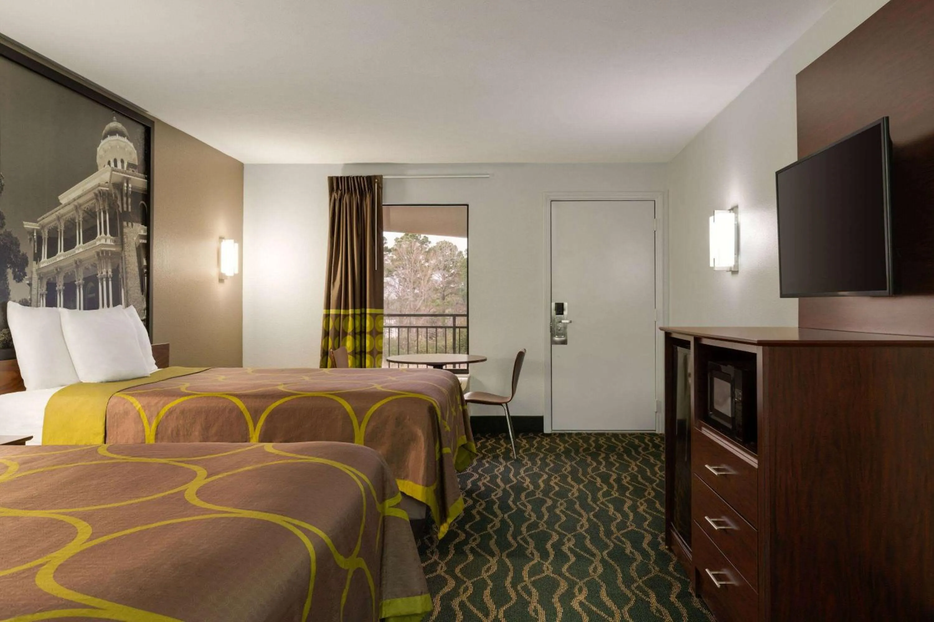 Photo of the whole room, Bed in Super 8 by Wyndham Pearl/Jackson/East