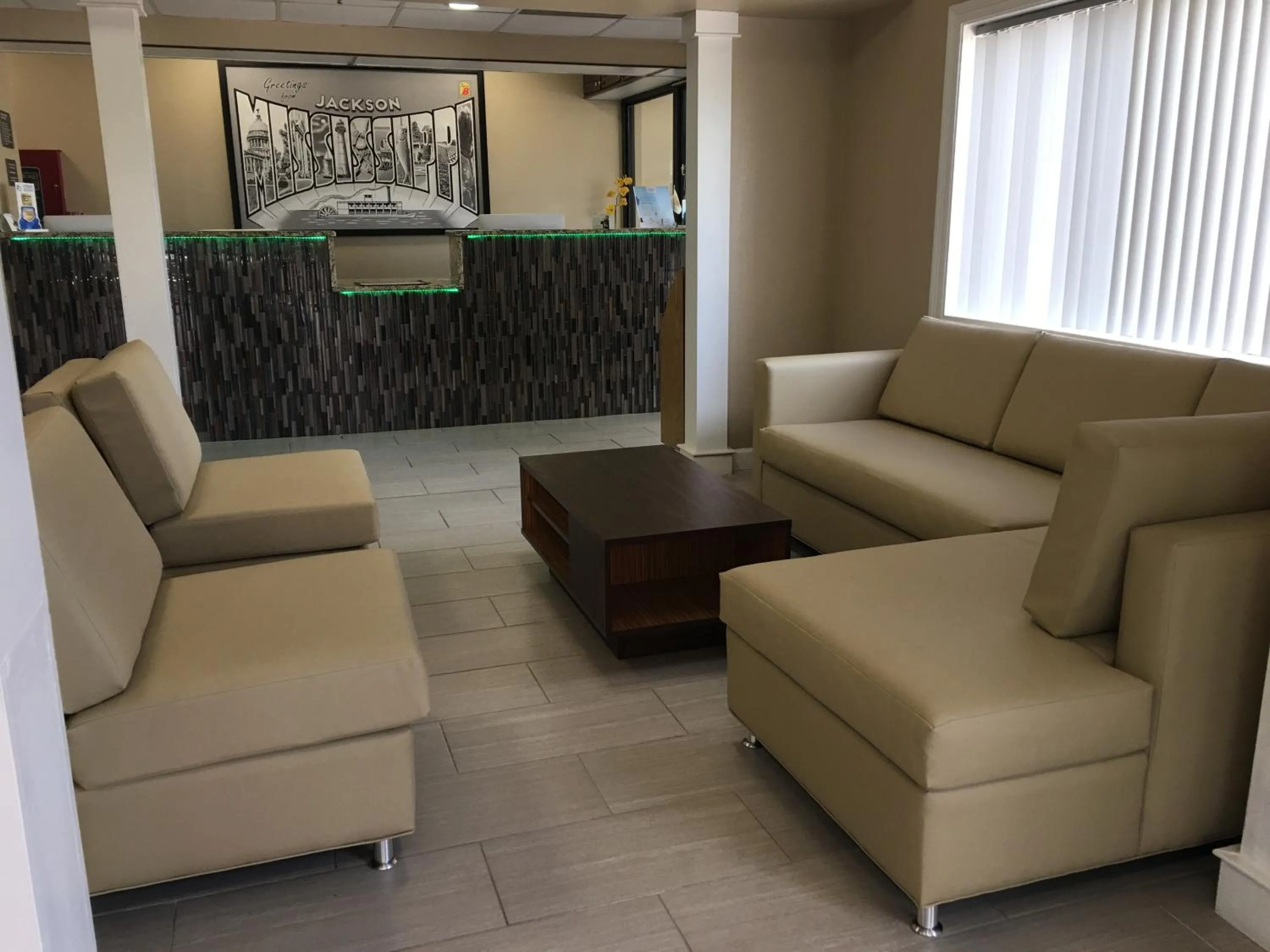 Seating area in Super 8 by Wyndham Jackson Ridgeland