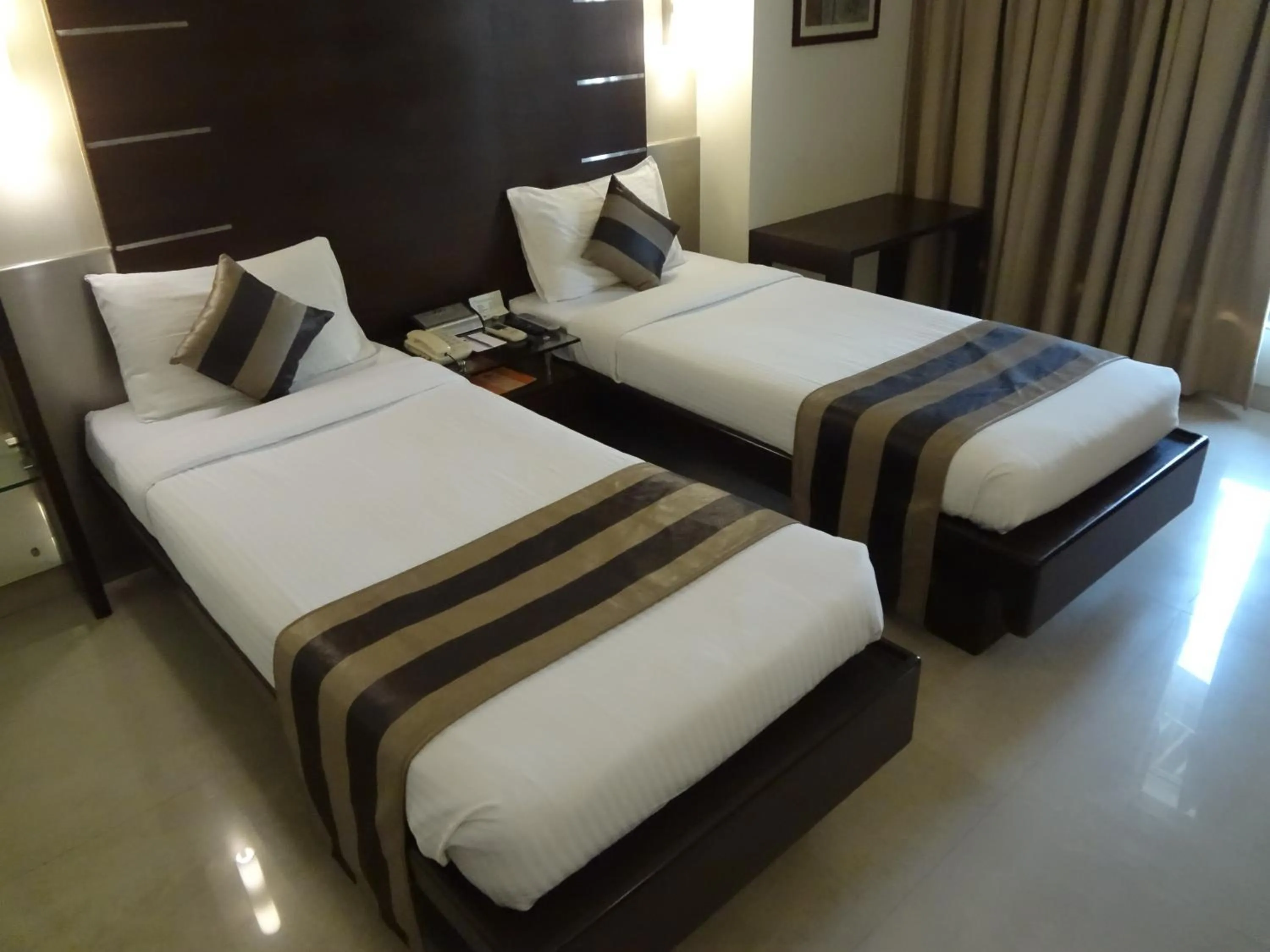Photo of the whole room, Bed in Hotel Suba Galaxy Mumbai