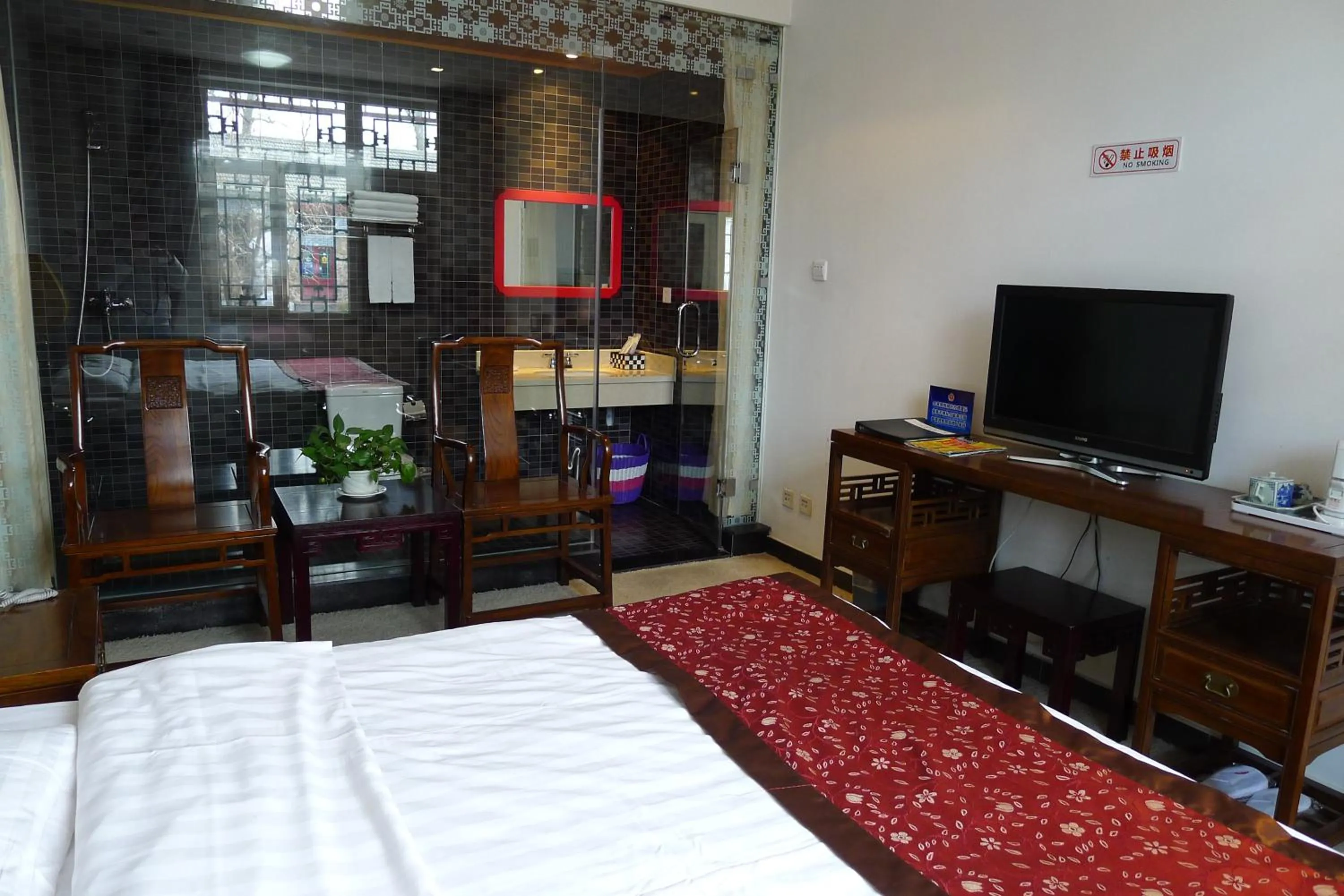 Photo of the whole room, TV/Entertainment Center in Ming Courtyard