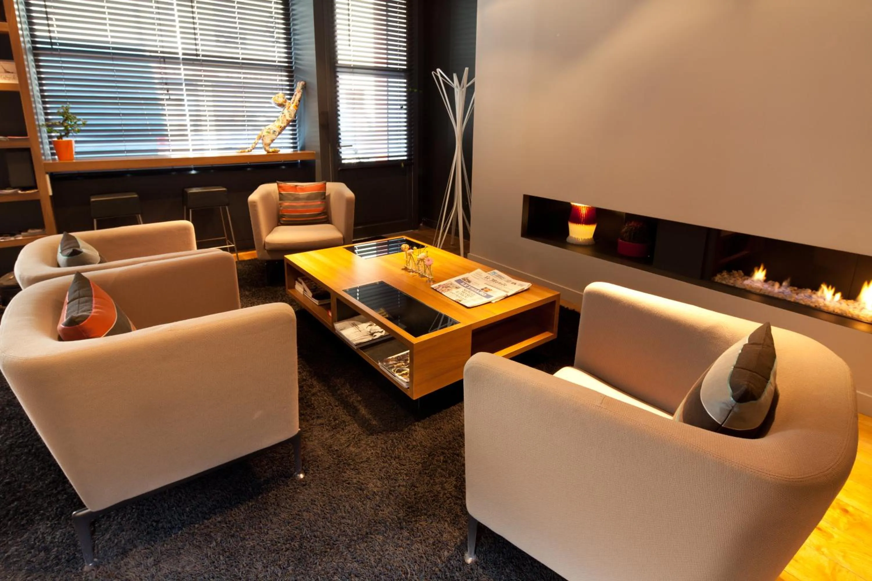 Communal lounge/ TV room in Fred'Hotel