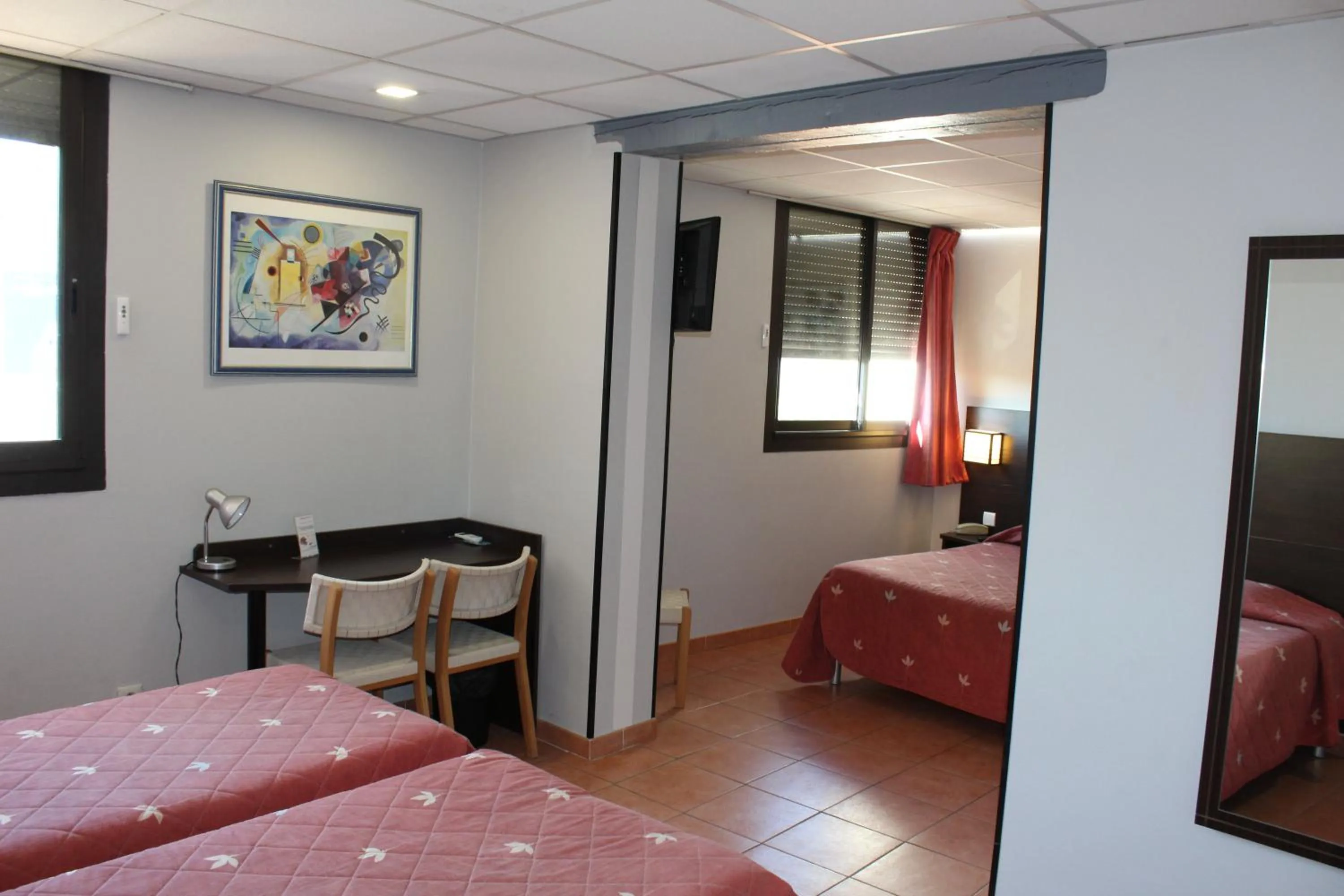 Bed in Hôtel L'Hacienda