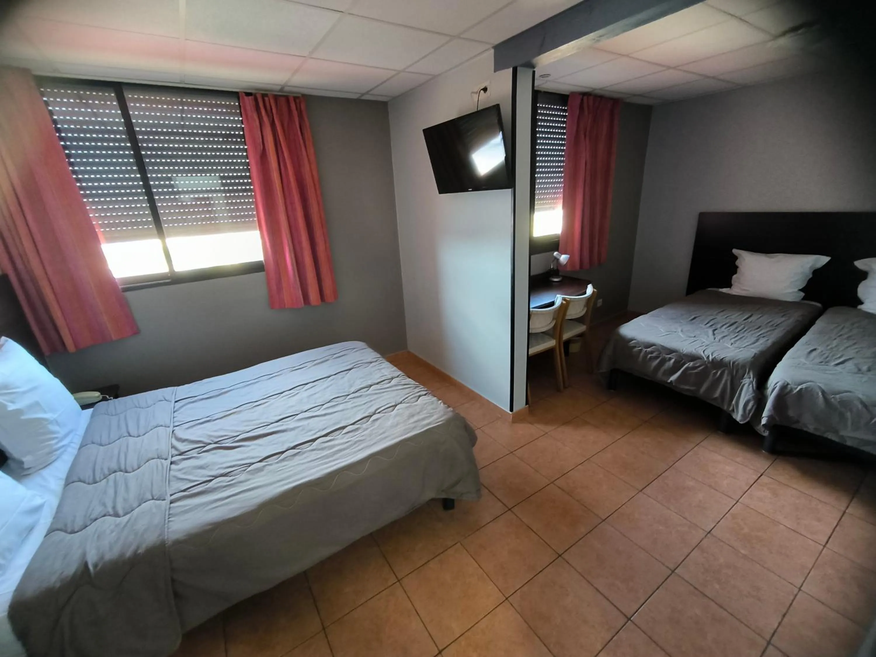 Bed in Hôtel L'Hacienda