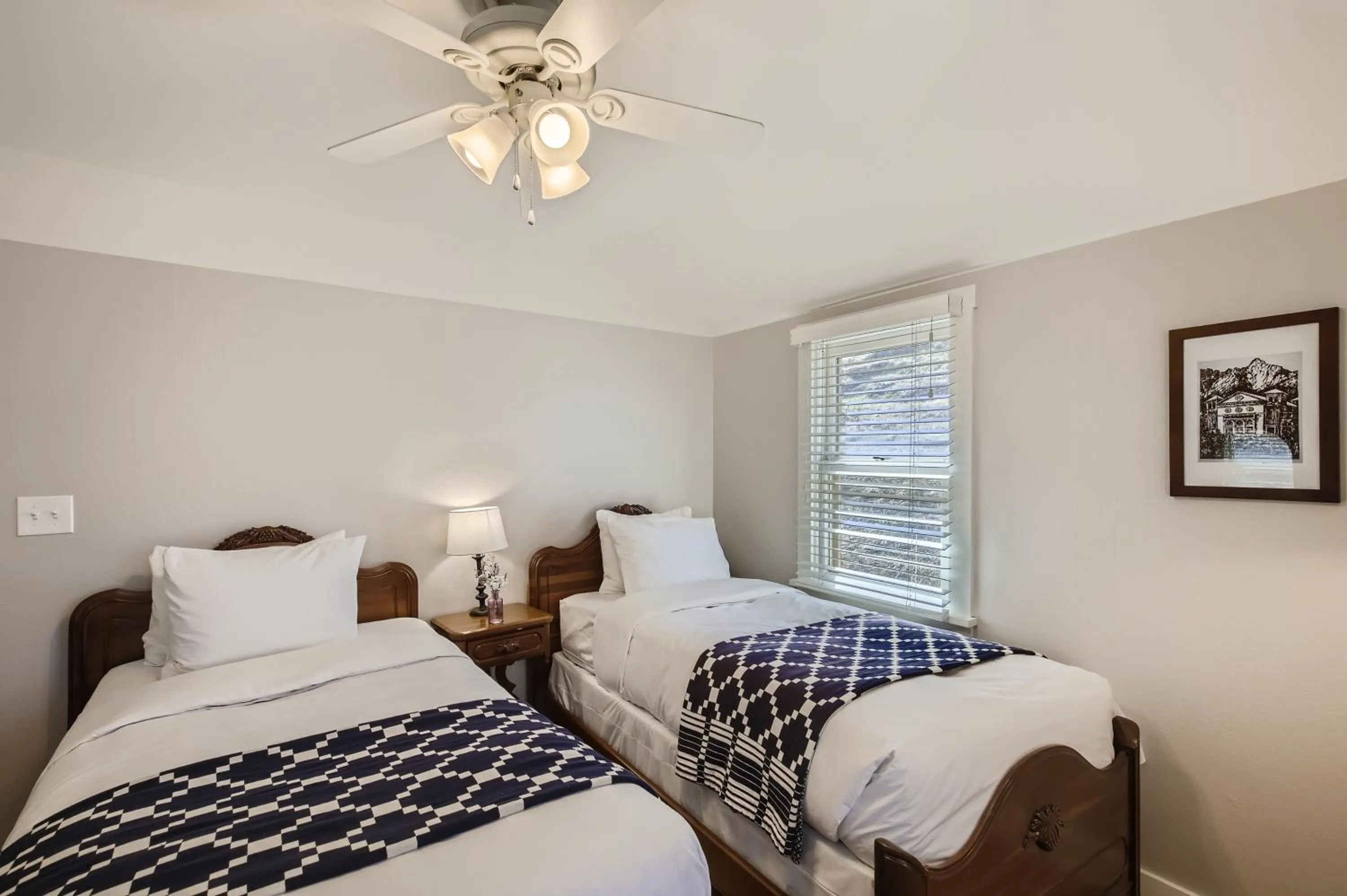 Bed in Colorado Chautauqua Cottages
