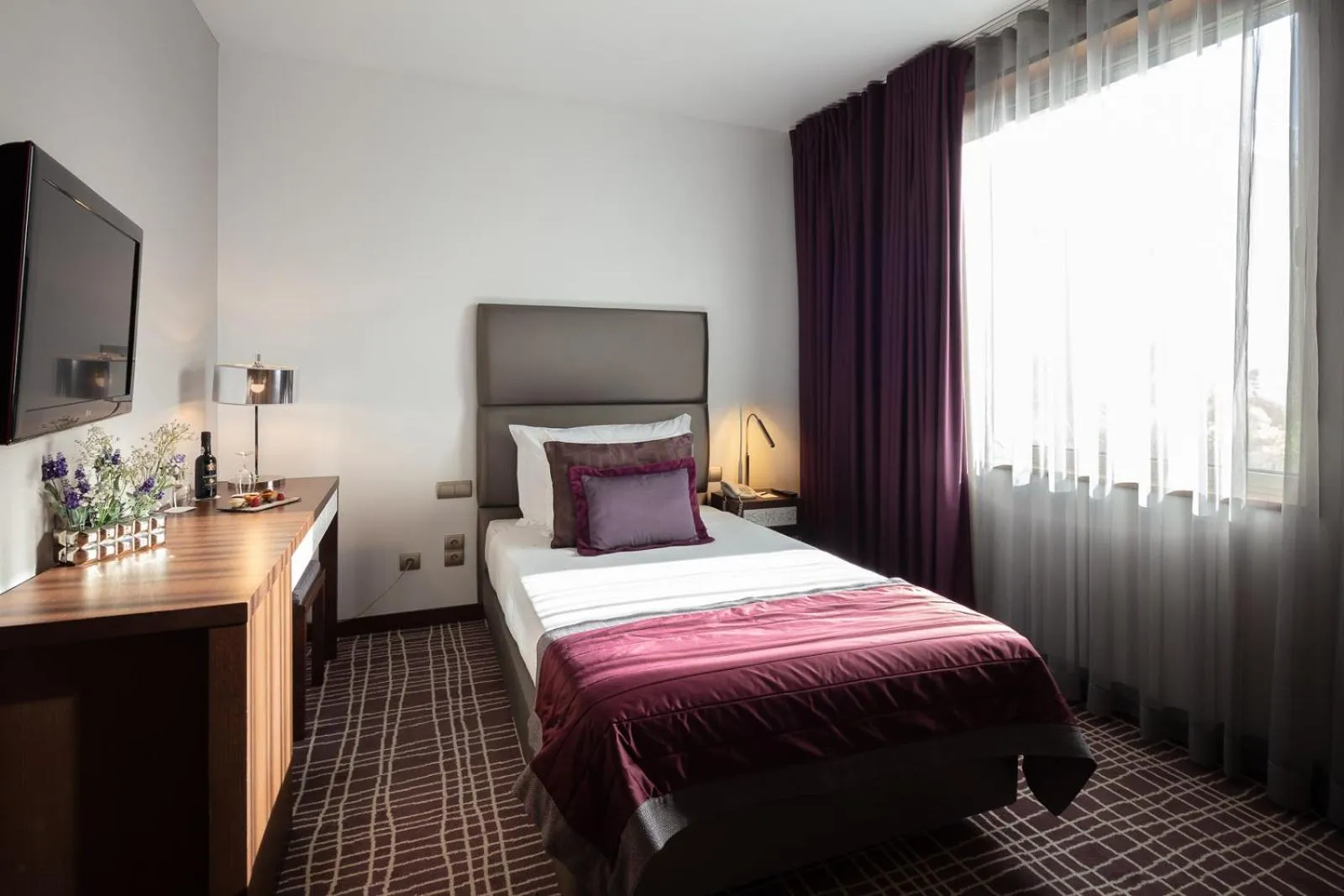 Bed in NEYA Lisboa Hotel