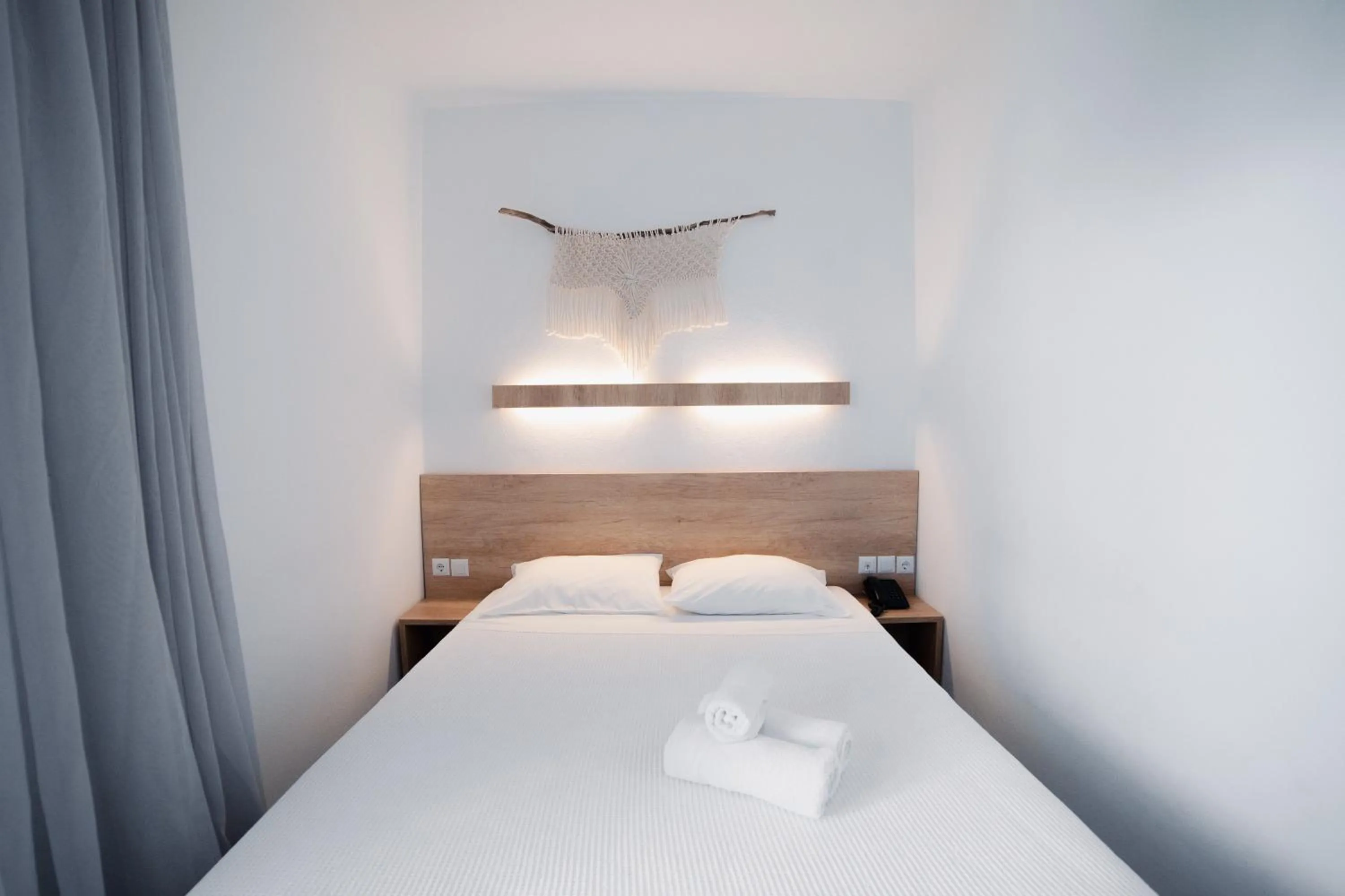 Bed in Calma Beach Hotel