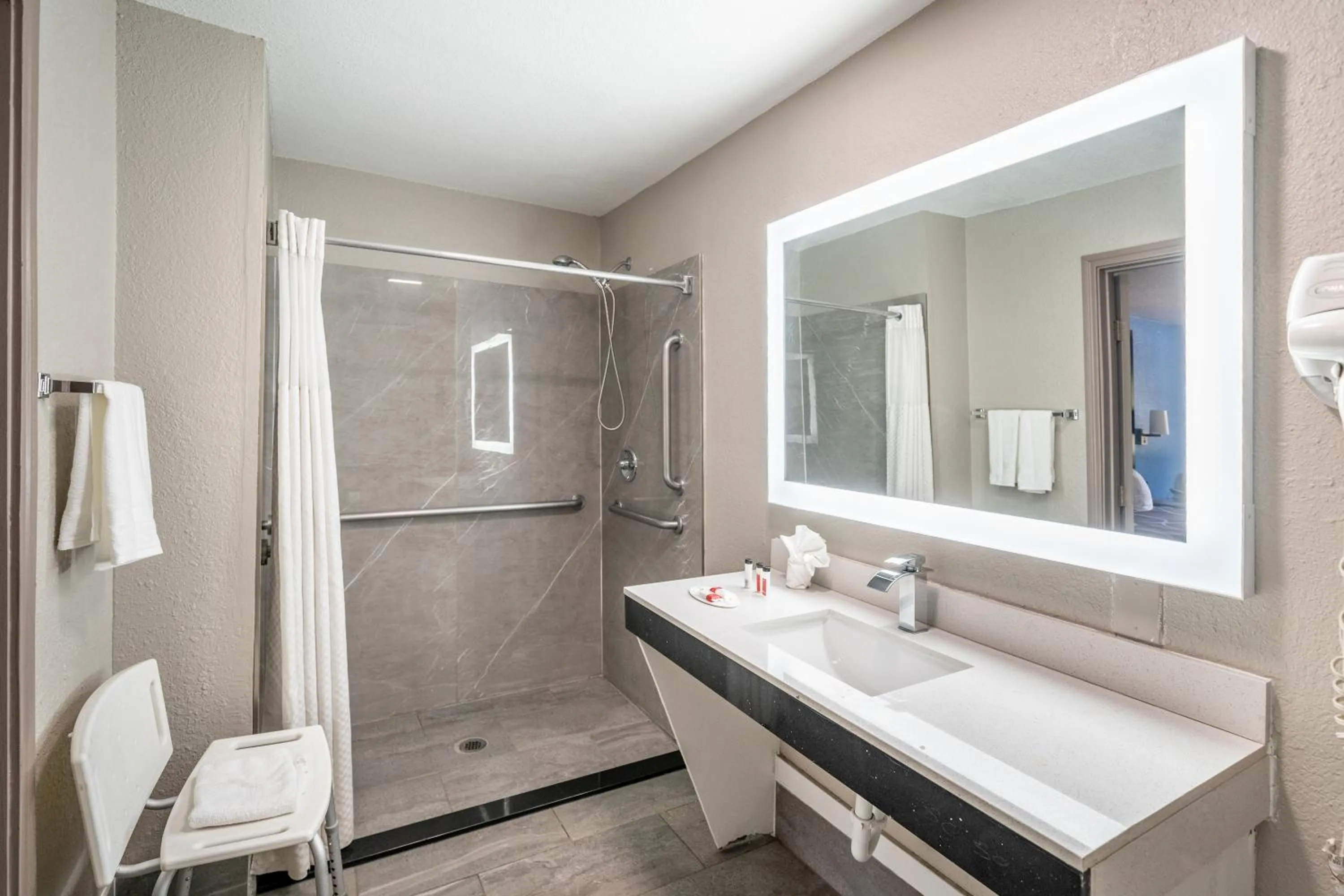 Toilet in Super 8 by Wyndham San Antonio/Riverwalk Area