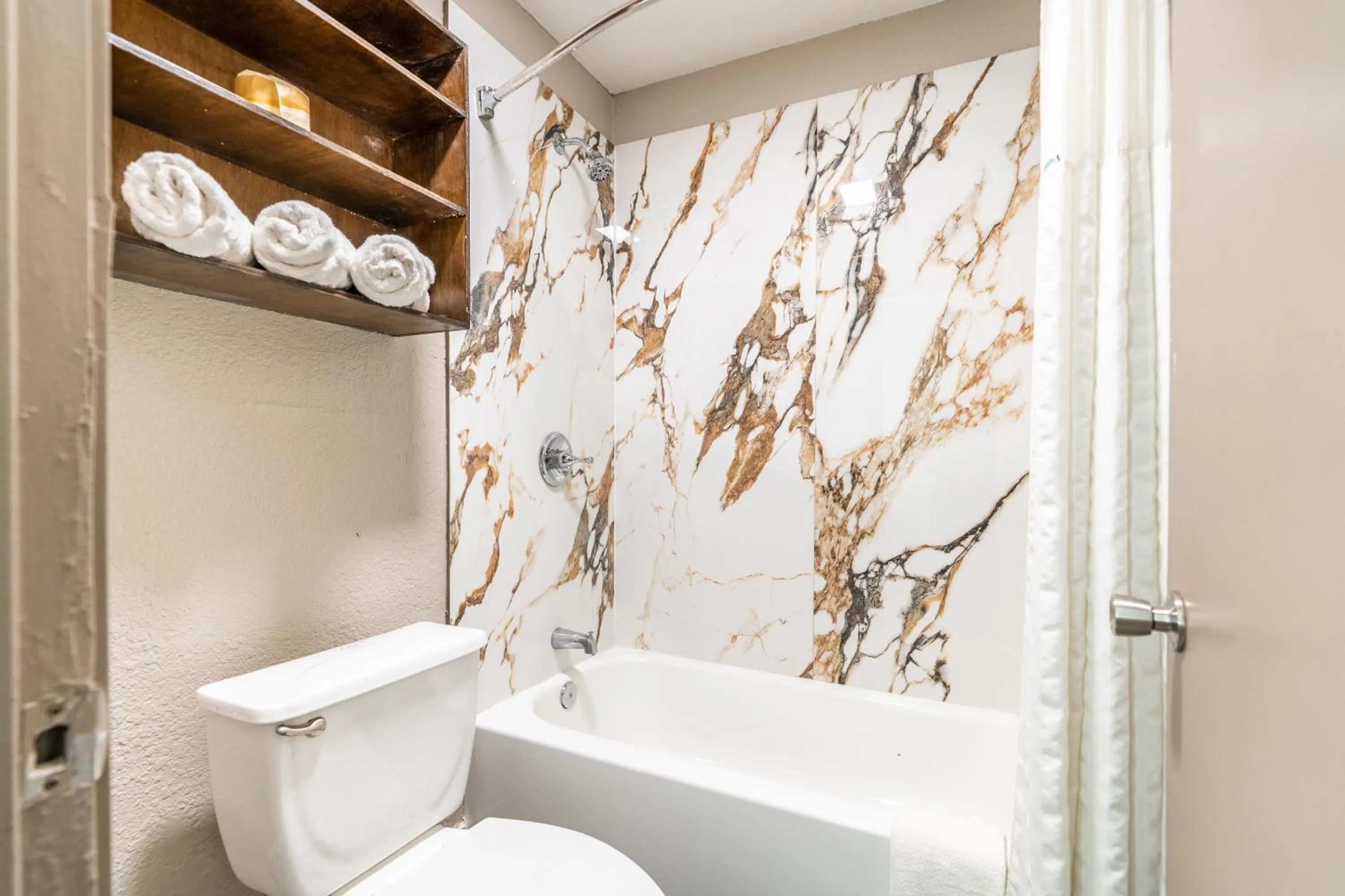 Bathroom in Super 8 by Wyndham San Antonio/Riverwalk Area