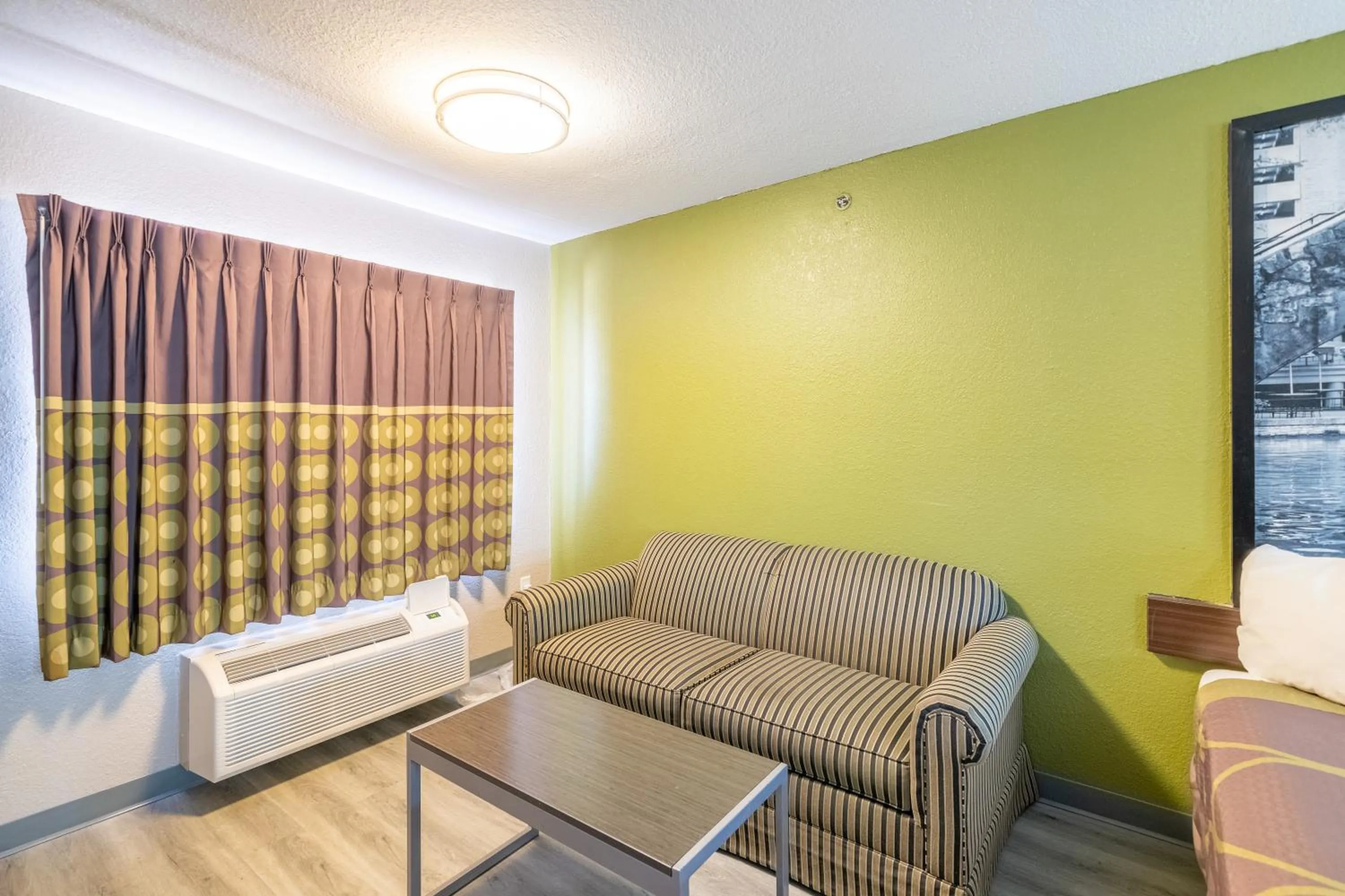 Seating area in Super 8 by Wyndham San Antonio/Riverwalk Area