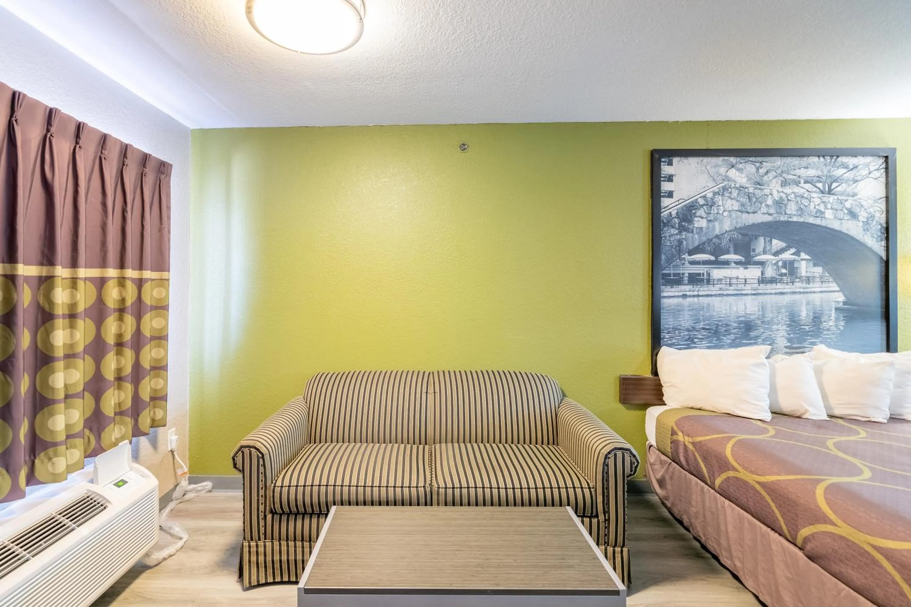Seating area, Bed in Super 8 by Wyndham San Antonio/Riverwalk Area