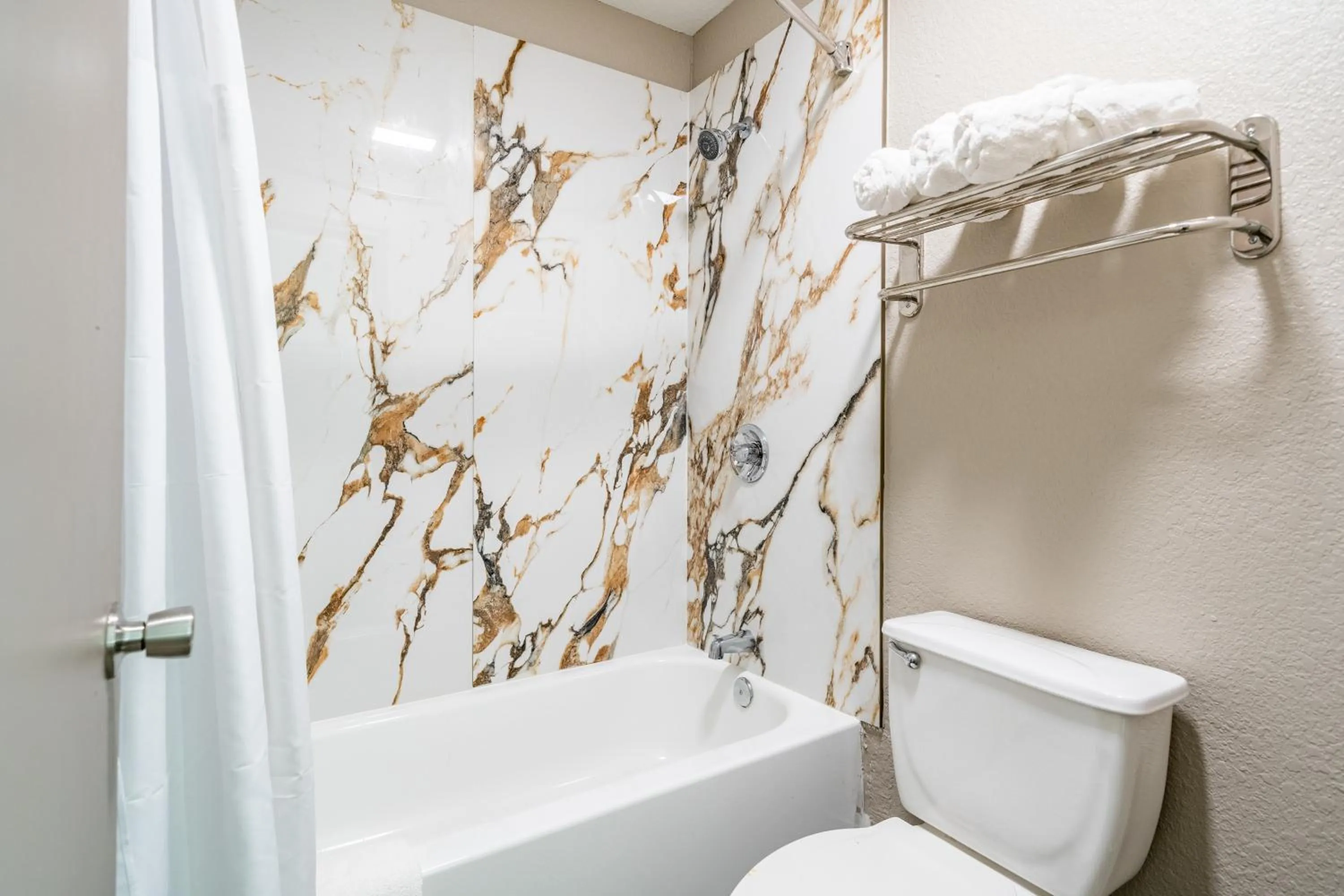 Bathroom in Super 8 by Wyndham San Antonio/Riverwalk Area