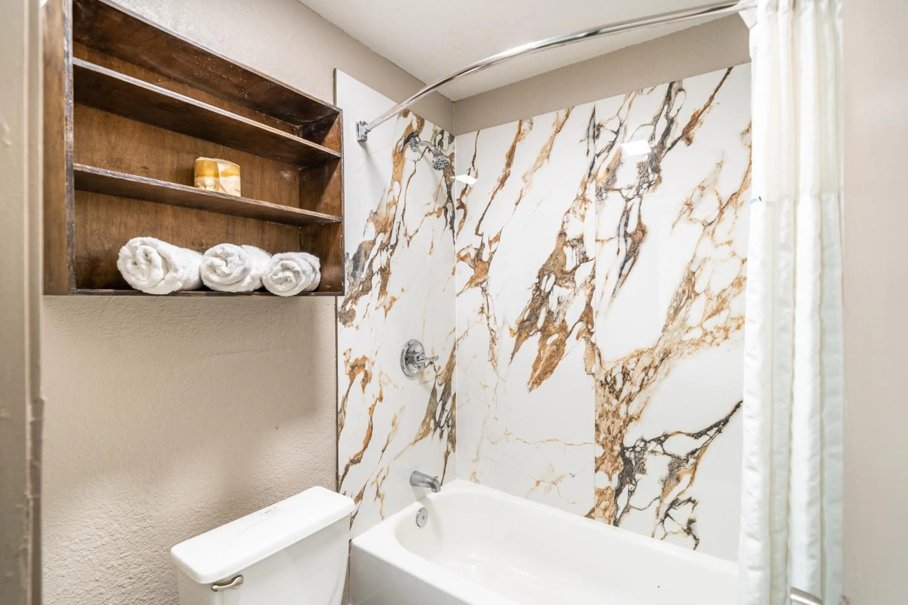 Bathroom in Super 8 by Wyndham San Antonio/Riverwalk Area