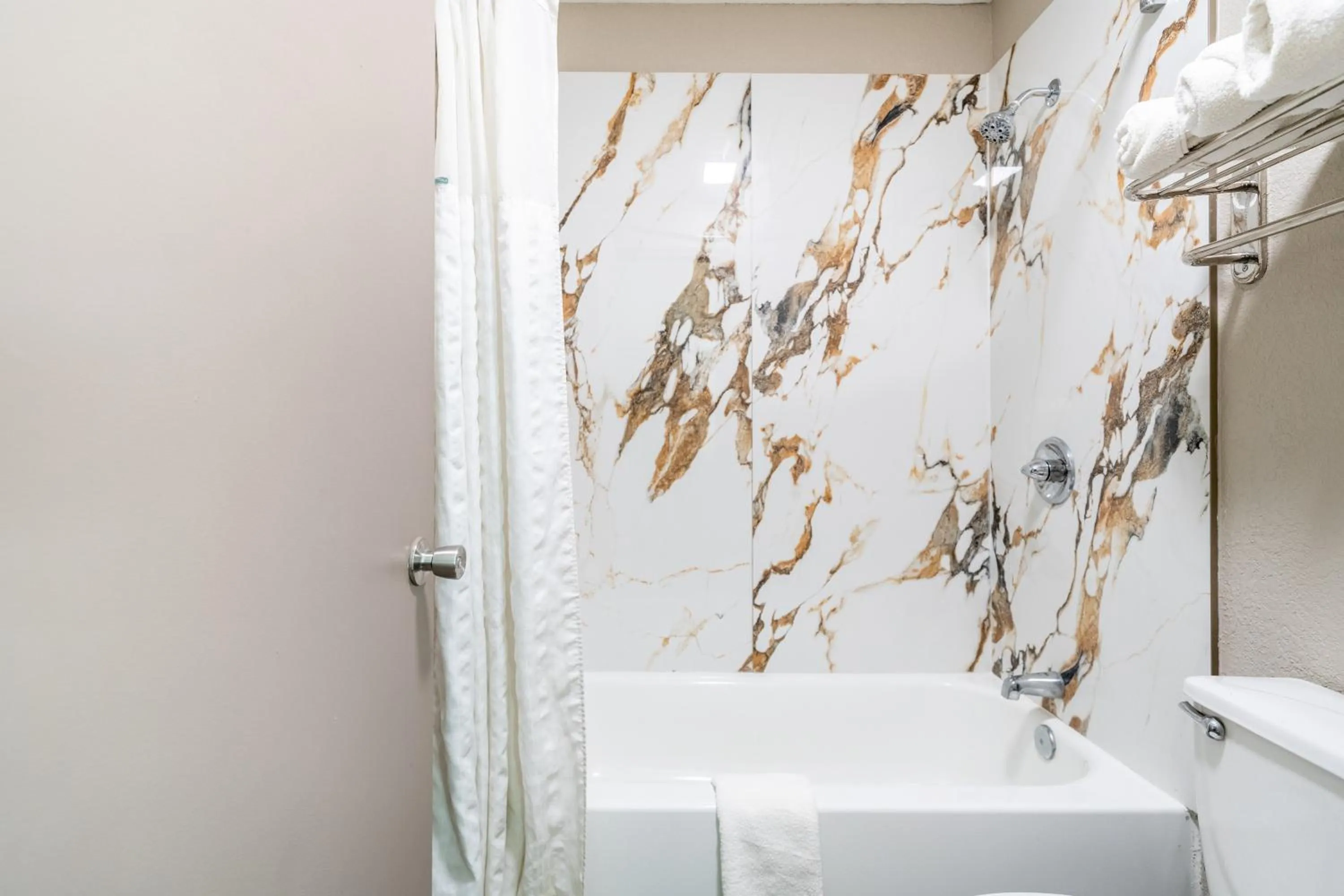 Bathroom in Super 8 by Wyndham San Antonio/Riverwalk Area